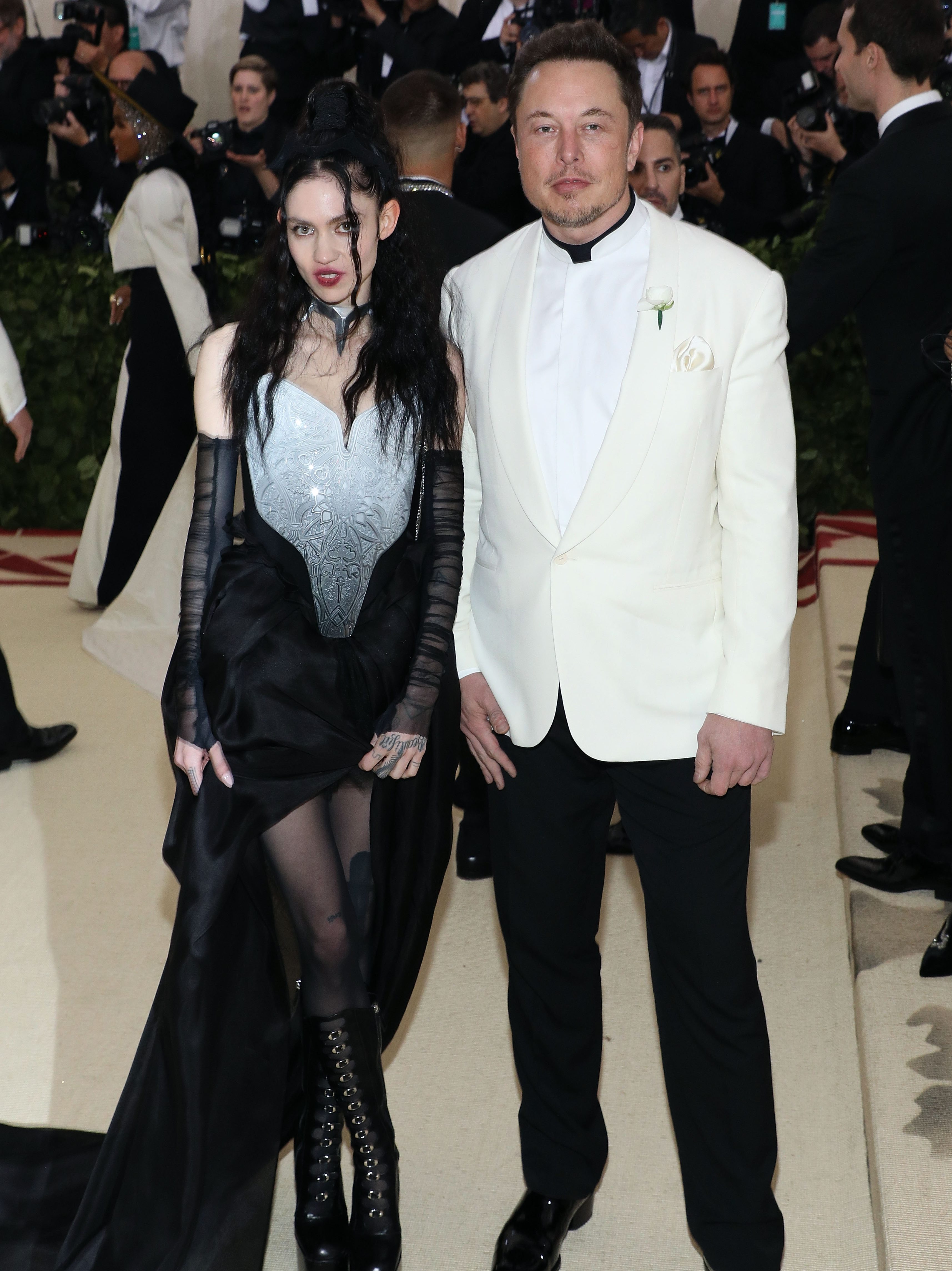 NEW YORK, NY - MAY 07:  Grimes and Elon Musk attend "Heavenly Bodies: Fashion & the Catholic Imagination", the 2018 Costume Institute Benefit at Metropolitan Museum of Art on May 7, 2018 in New York City.  (Photo by Taylor Hill/Getty Images)