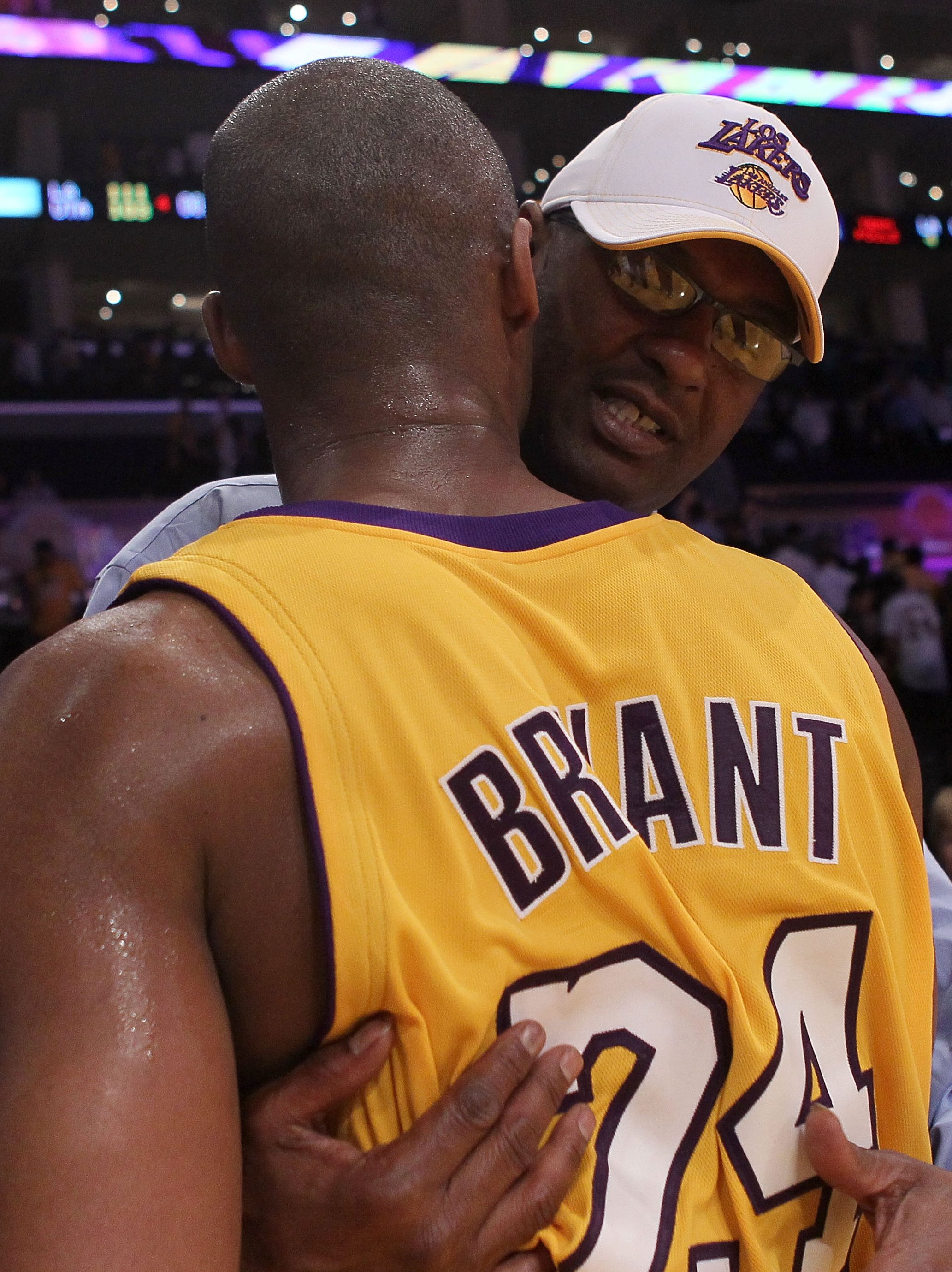 LOS ANGELES, CA - MAY 04:  Joe Bryant hugs his son Kobe Bryant #24 of the Los Angeles Lakers after the Lakers 111-103 victory against the Utah Jazz during Game Two of the Western Conference Semifinals of the 2010 NBA Playoffs at Staples Center on May 4, 2010 in Los Angeles, California.  (Photo by Stephen Dunn/Getty Images)