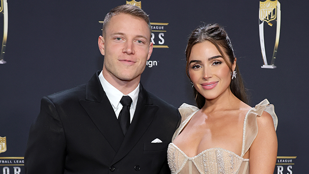 Olivia Culpo and Christian McCaffrey at event.