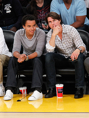 Tom Cruise and Connor Cruise at basketball game.