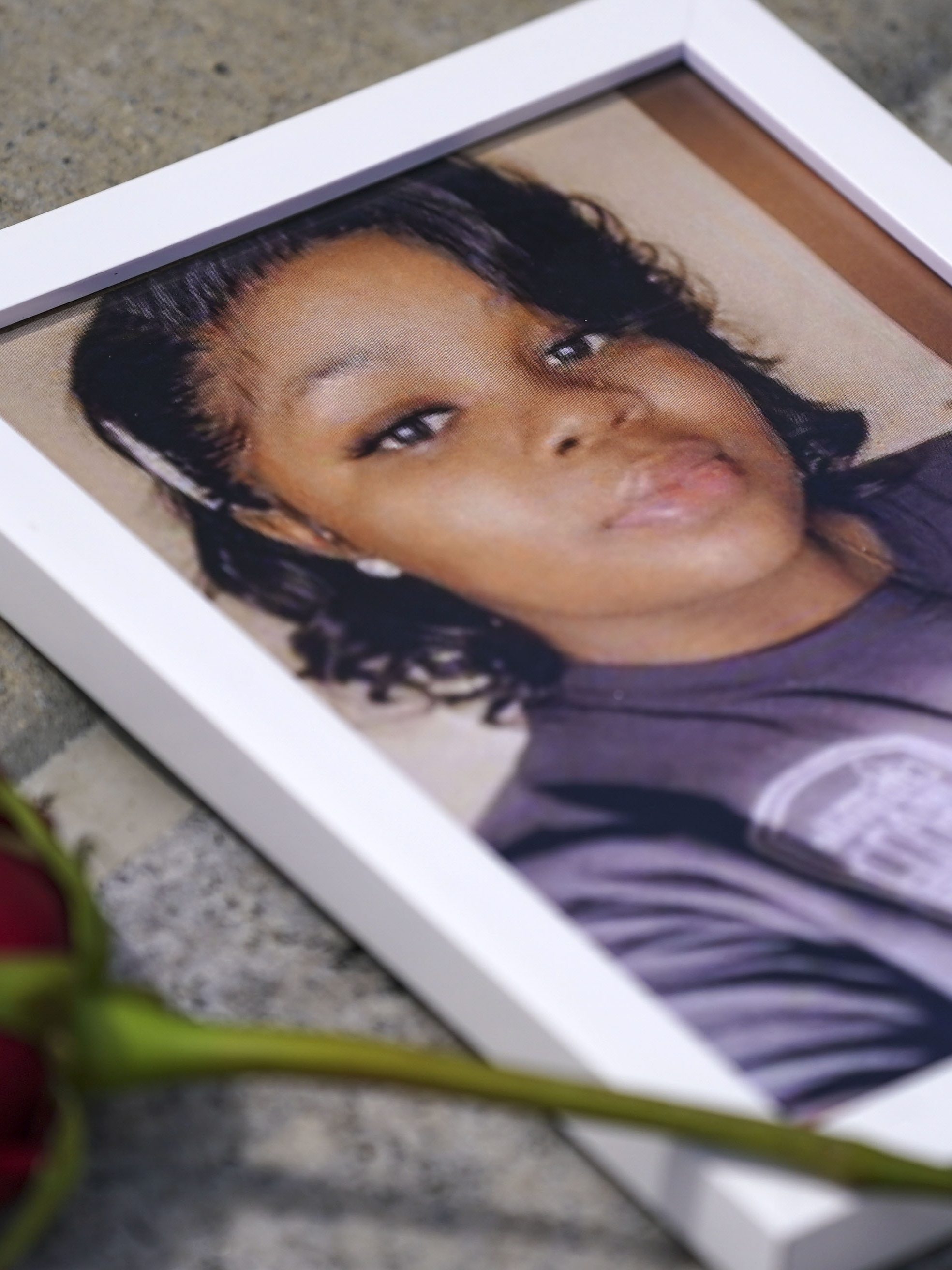 WASHINGTON, DC - JULY 30: A photo of Breonna Taylor is seen among other photos of women who have lost their lives as a result of violence during the 2nd Annual Defend Black Women March in Black Lives Matter Plaza on July 30, 2022 in Washington, DC. (Photo by Leigh Vogel/Getty Images for Frontline Action Hub)