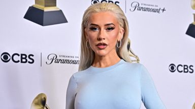 US singer-songwriter Christina Aguilera poses in the press room during the 66th Annual Grammy Awards at the Crypto.com Arena in Los Angeles on February 4, 2024. (Photo by Frederic J. Brown / AFP) (Photo by FREDERIC J. BROWN/AFP via Getty Images)