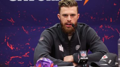 LAS VEGAS, NV - FEBRUARY 5: Harrison Butker #7 of the Kansas City Chiefs speaks with the media during Super Bowl LVIII Opening Night at Allegiant Stadium on February 5, 2024 in Las Vegas, NV. (Photo by Perry Knotts/Getty Images)