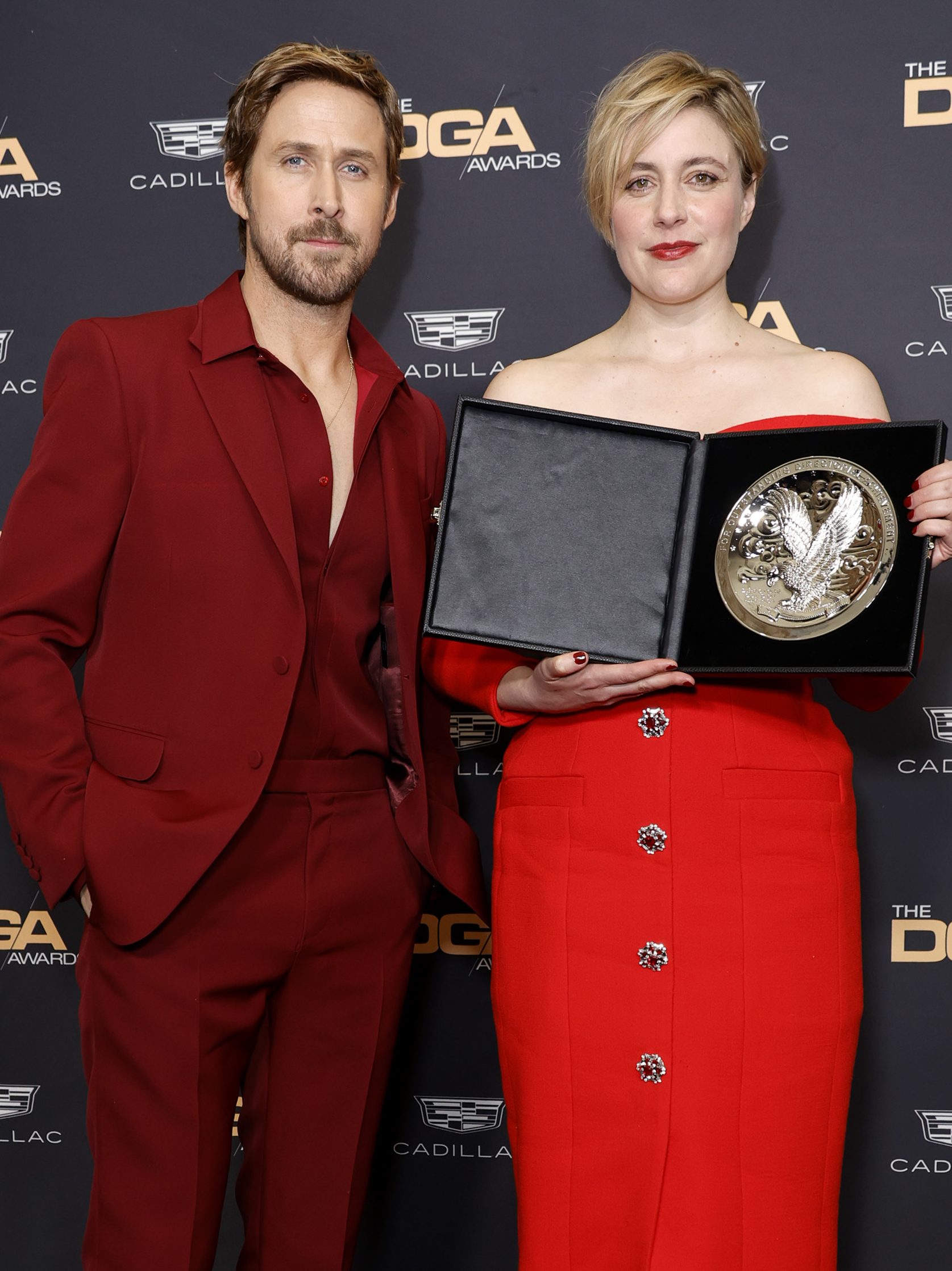 BEVERLY HILLS, CALIFORNIA - FEBRUARY 10: (L-R) Ryan Gosling and Greta Gerwig, recipient of a Directors Guild of America Awards Feature Film Medallion for "Barbie," pose in the press room during the 76th Directors Guild of America Awards at The Beverly Hilton on February 10, 2024 in Beverly Hills, California. (Photo by Frazer Harrison/Getty Images for DGA)