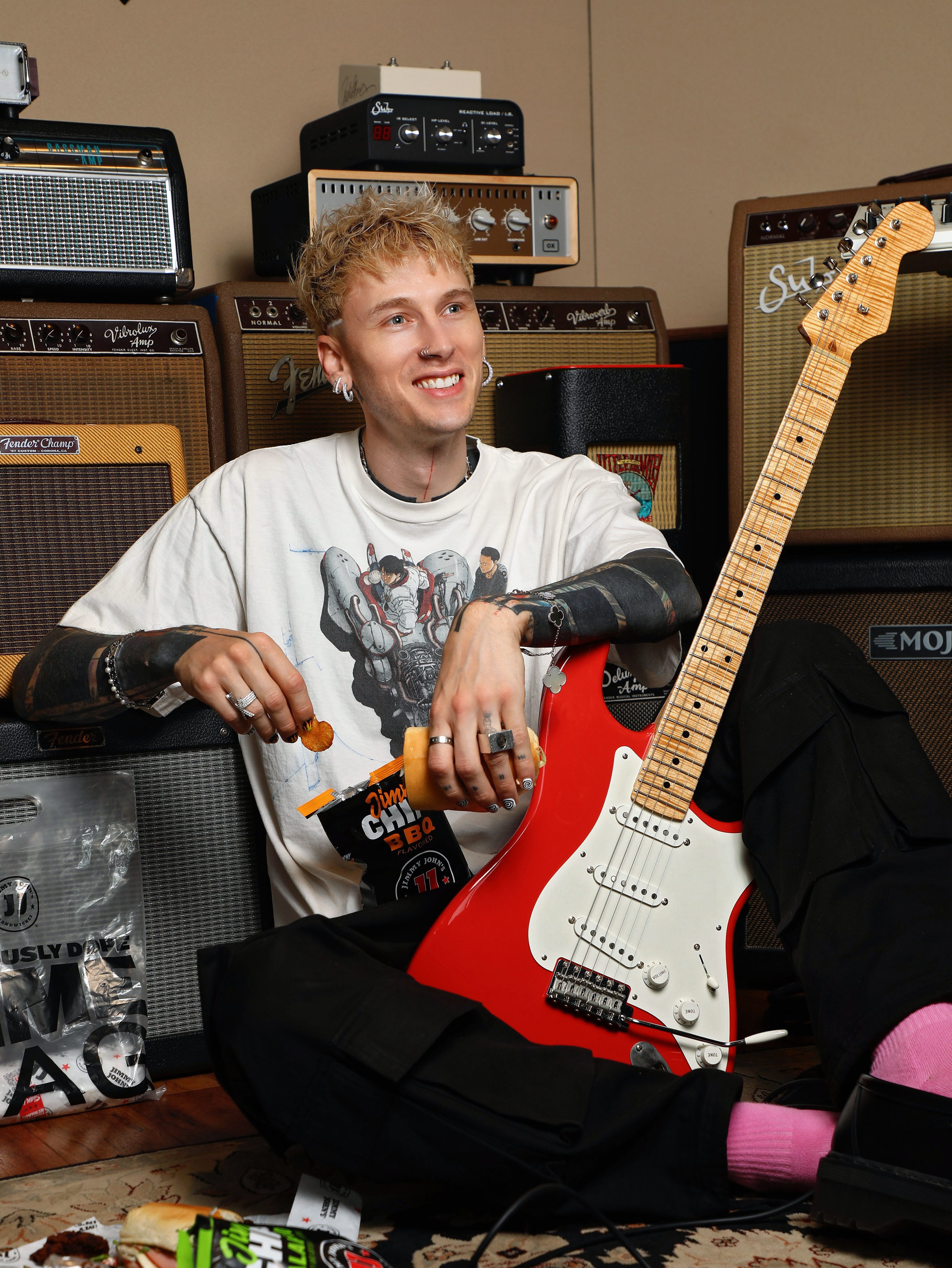 NASHVILLE, TENNESSEE – In this image released on April 18, with a nod to 420, Machine Gun Kelly munches on Jimmy John's Deliciously Dope Dime Bag meal combo during a recording session in Nashville, Tennessee. (Photo by Sara Jaye/Getty Images for Jimmy John’s)