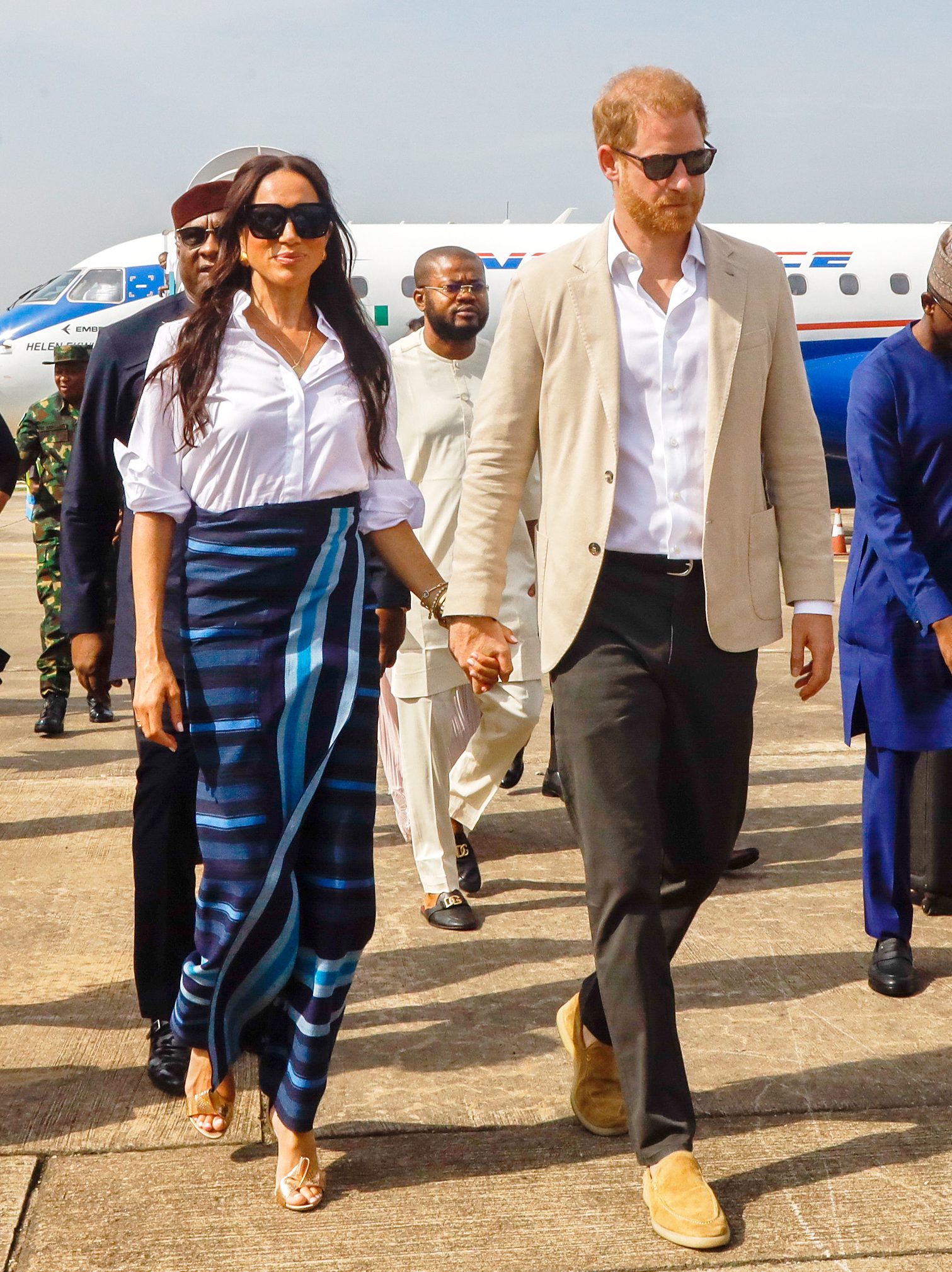 LAGOS, NIGERIA - MAY 12: (EDITORIAL USE ONLY) Prince Harry, Duke of Sussex and Meghan, Duchess of Sussex arrive at the Lagos airport for Official State Welcome on May 12, 2024 in Lagos, Nigeria. (Photo by Andrew Esiebo/Getty Images for The Archewell Foundation)