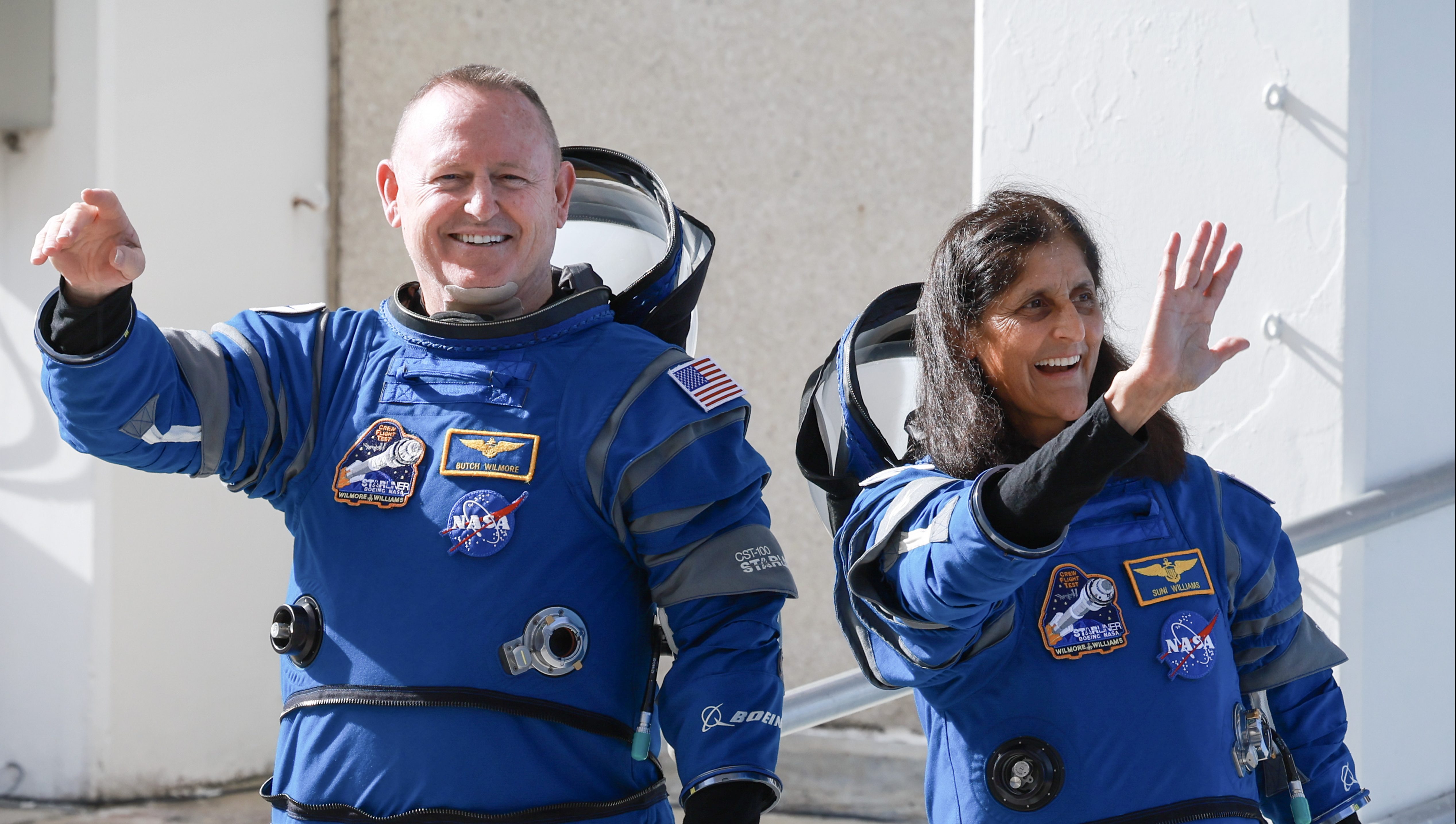 CAPE CANAVERAL, FLORIDA - JUNE 01:  NASA’s Boeing Crew Flight Test Commander Butch Wilmore (L) and Pilot Suni Williams walk out of the Operations and Checkout Building on June 01, 2024 in Cape Canaveral, Florida. The astronauts are heading to Boeing’s Starliner spacecraft, which sits atop a United Launch Alliance Atlas V rocket at Space Launch Complex 41 for NASA’s Boeing crew flight test to the International Space Station.  (Photo by Joe Raedle/Getty Images)