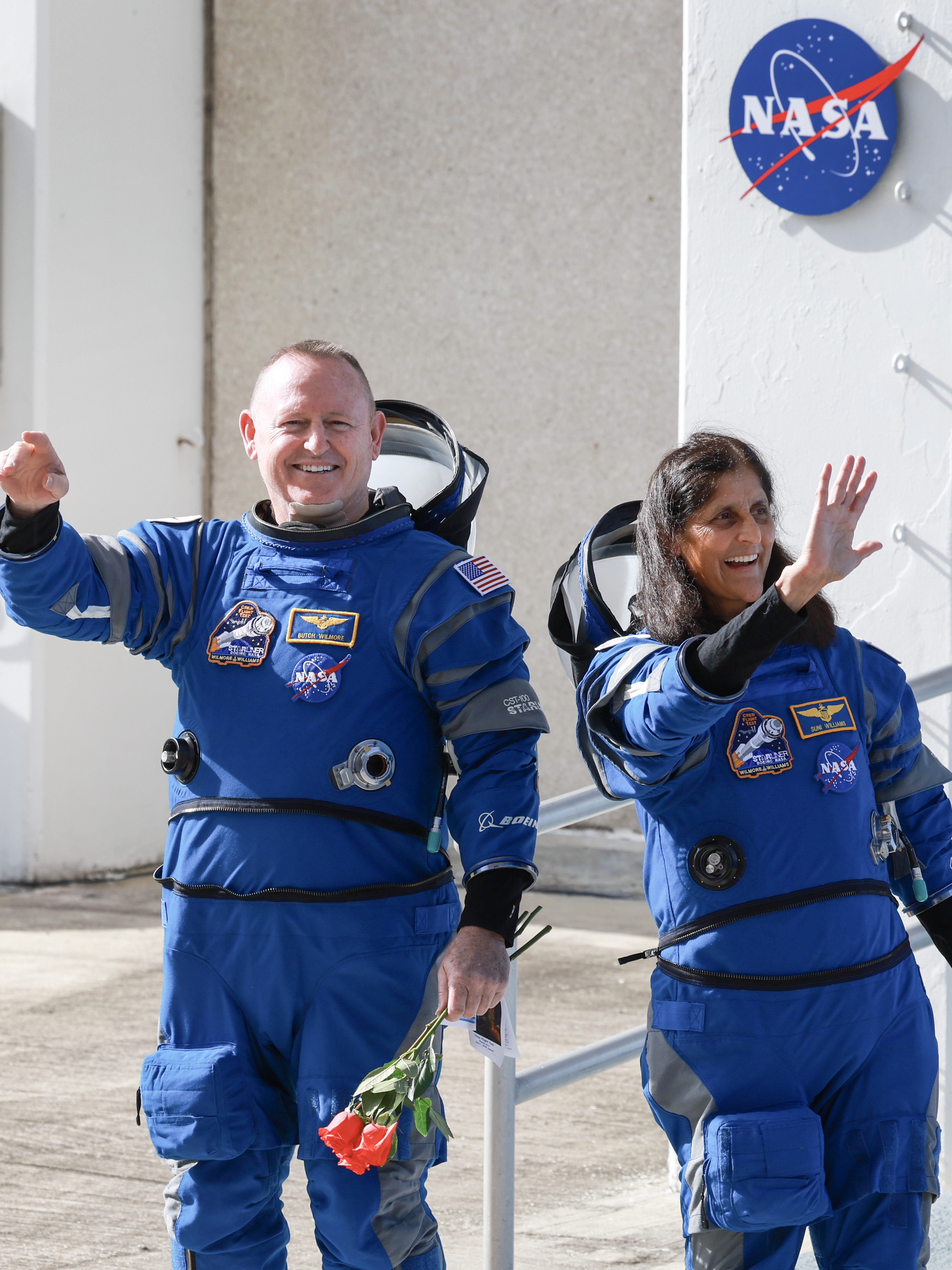 CAPE CANAVERAL, FLORIDA - JUNE 01:  NASA’s Boeing Crew Flight Test Commander Butch Wilmore (L) and Pilot Suni Williams walk out of the Operations and Checkout Building on June 01, 2024 in Cape Canaveral, Florida. The astronauts are heading to Boeing’s Starliner spacecraft, which sits atop a United Launch Alliance Atlas V rocket at Space Launch Complex 41 for NASA’s Boeing crew flight test to the International Space Station.  (Photo by Joe Raedle/Getty Images)
