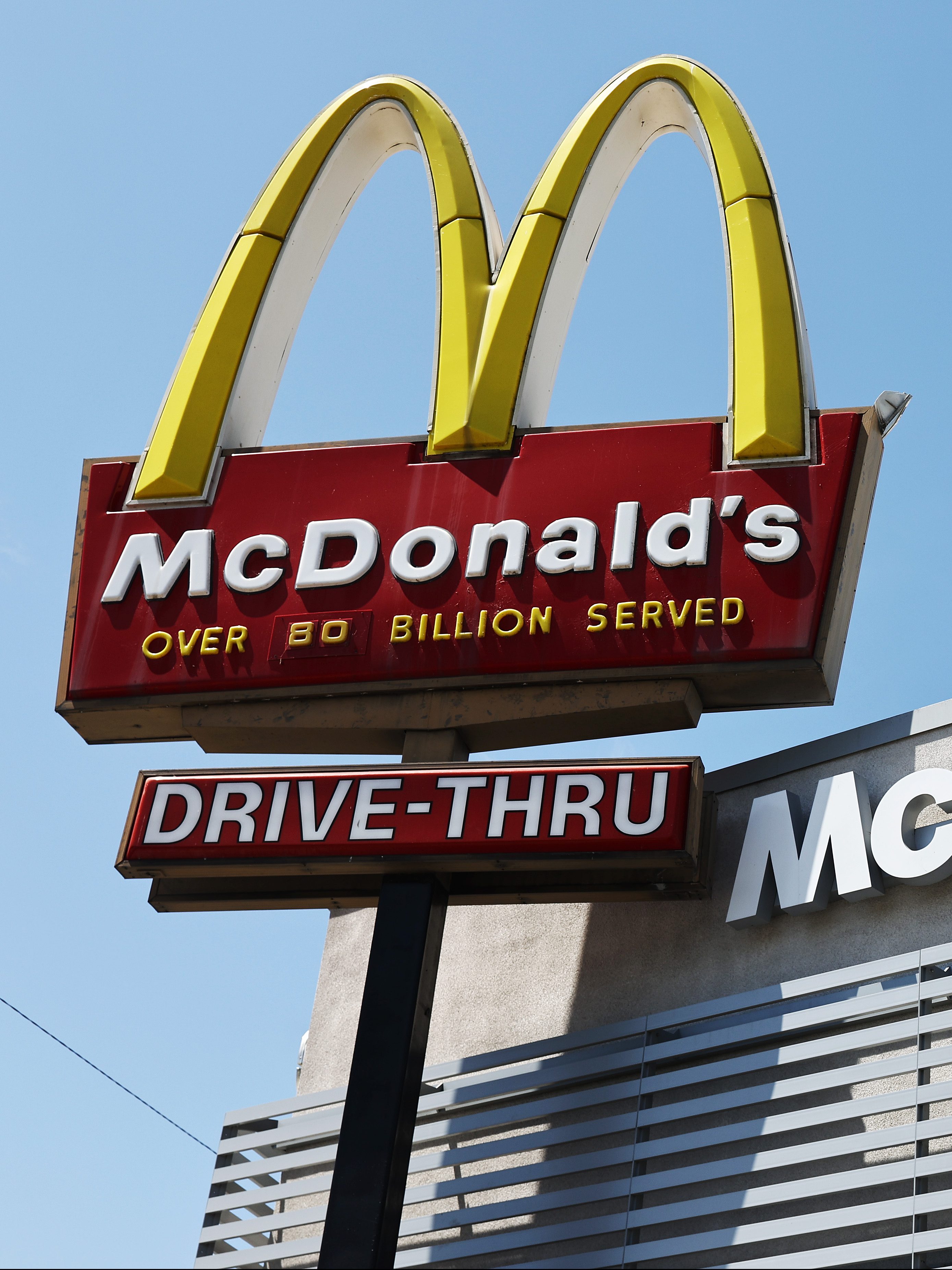 BURBANK, CALIFORNIA - JULY 22: The McDonald's logo is displayed at a McDonald's restaurant on July 22, 2024 in Burbank, California. McDonald’s is extending its $5 meal deal in most U.S. restaurants past its initial four-week offering with the fast-food icon saying the offer has driven customers back to its restaurants. (Photo by Mario Tama/Getty Images)