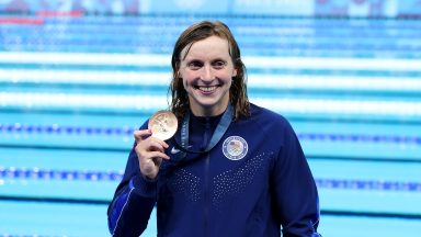 NANTERRE, FRANCE - JULY 27: Bronze Medalist, Katie Ledecky  of Team United States poses with her medal following the Medal Ceremony after the Women's 400m Freestyle Final on day one of the Olympic Games Paris 2024 at Paris La Defense Arena on July 27, 2024 in Nanterre, France. (Photo by Sarah Stier/Getty Images)