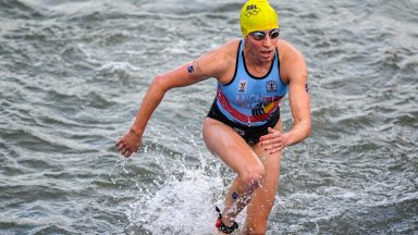 Belgian Claire Michel pictured in action during the women's individual triathlon race at the Paris 2024 Olympic Games, on Wednesday 31 July 2024 in Paris, France. The Games of the XXXIII Olympiad are taking place in Paris from 26 July to 11 August. The Belgian delegation counts 165 athletes competing in 21 sports. BELGA PHOTO JASPER JACOBS (Photo by JASPER JACOBS / BELGA MAG / Belga via AFP) (Photo by JASPER JACOBS/BELGA MAG/AFP via Getty Images)