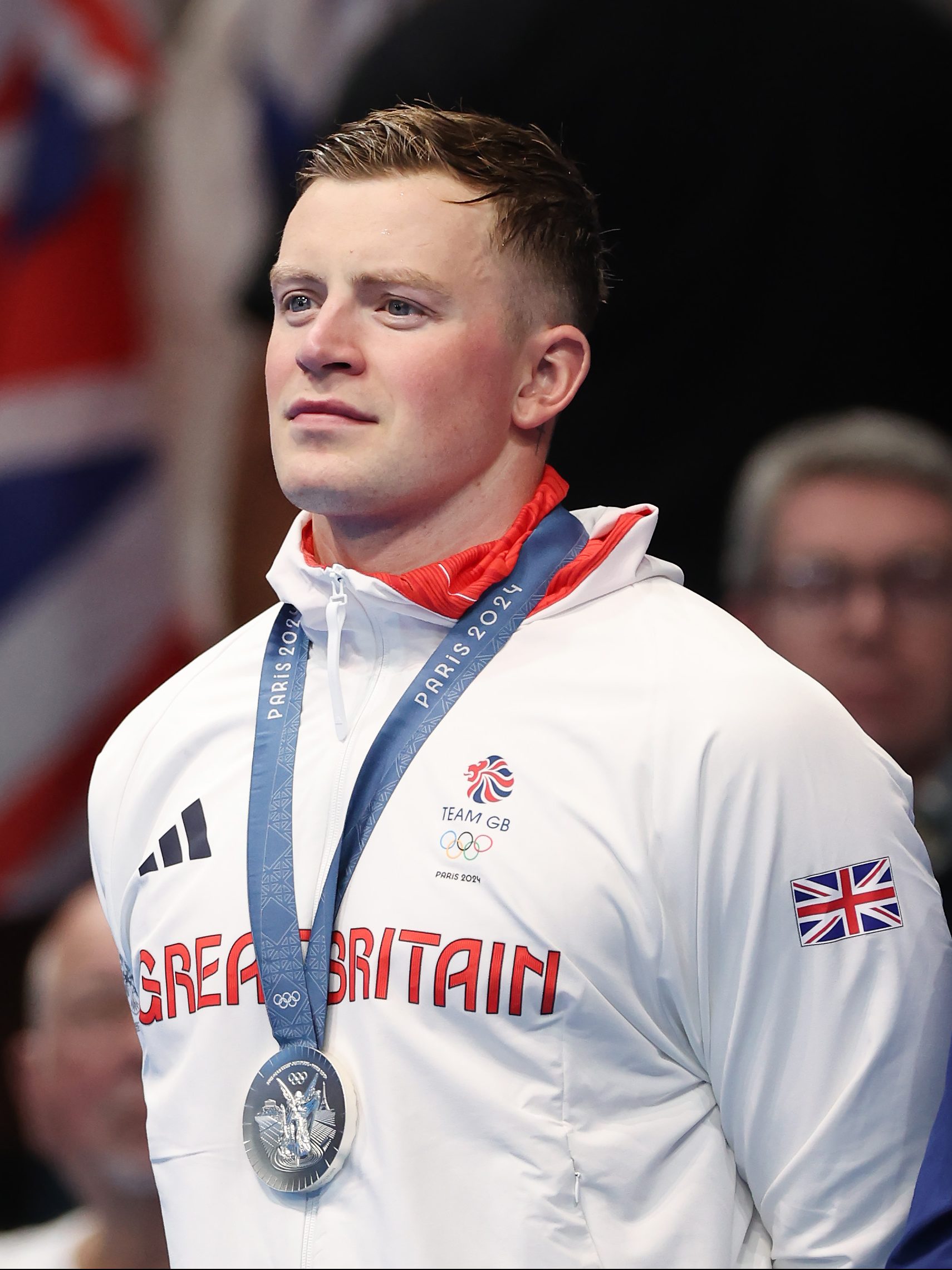 NANTERRE, FRANCE - JULY 28: Adam Peaty of Team Great Britain is seen on the podium with his silver medal from the Men's 100m Breaststroke final on day two of the Olympic Games Paris 2024 at Paris La Defense Arena on July 28, 2024 in Nanterre, France. (Photo by Ian MacNicol/Getty Images)