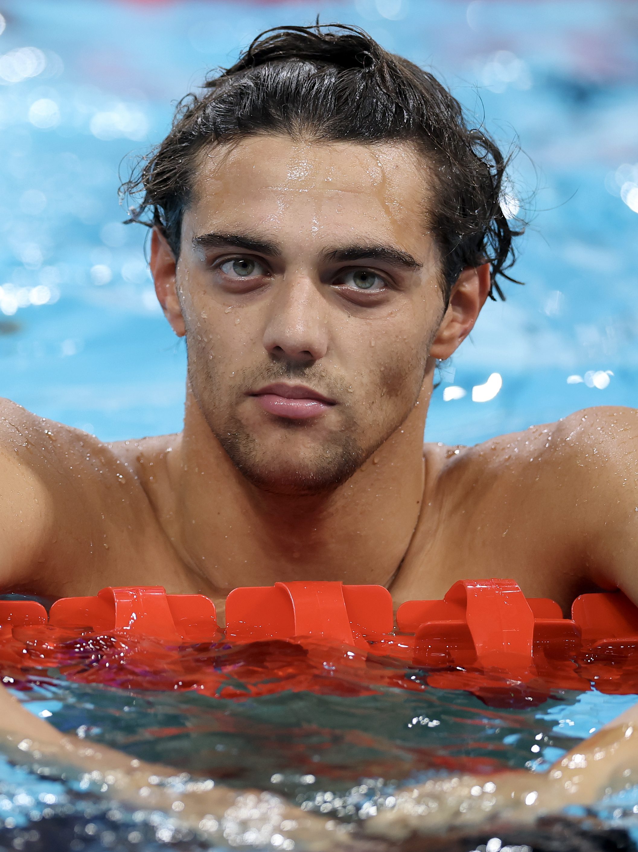 NANTERRE, FRANCE - JULY 31: Thomas Ceccon of Team Italy reacts after competing in the Men's 200m Backstroke Semifinals on day five of the Olympic Games Paris 2024 at Paris La Defense Arena on July 31, 2024 in Nanterre, France. (Photo by Maddie Meyer/Getty Images)