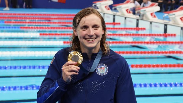 Katie Ledecky of Team United States poses with her Gold medal