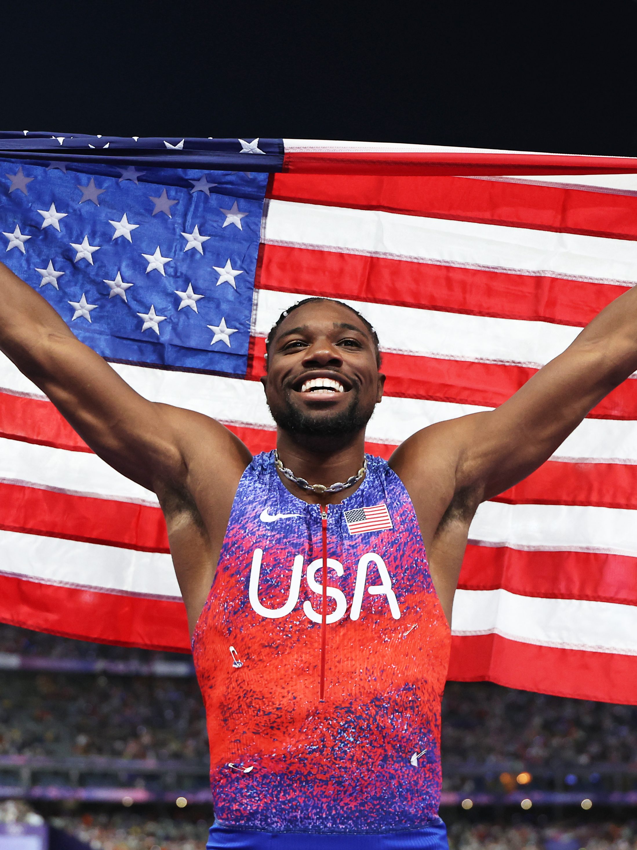 PARIS, FRANCE - AUGUST 04: Noah Lyles of Team United States celebrates winning the gold medal in the Men's 100m Final on day nine of the Olympic Games Paris 2024 at Stade de France on August 04, 2024 in Paris, France. (Photo by Christian Petersen/Getty Images)