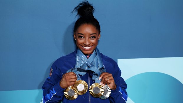 PARIS, FRANCE - AUGUST 05: Simone Biles of Team United States poses with her Paris 2024 Olympic medals following the Artistic Gymnastics Women's Floor Exercise Final on day ten of the Olympic Games Paris 2024 at Bercy Arena on August 05, 2024 in Paris, France. (Photo by Naomi Baker/Getty Images)