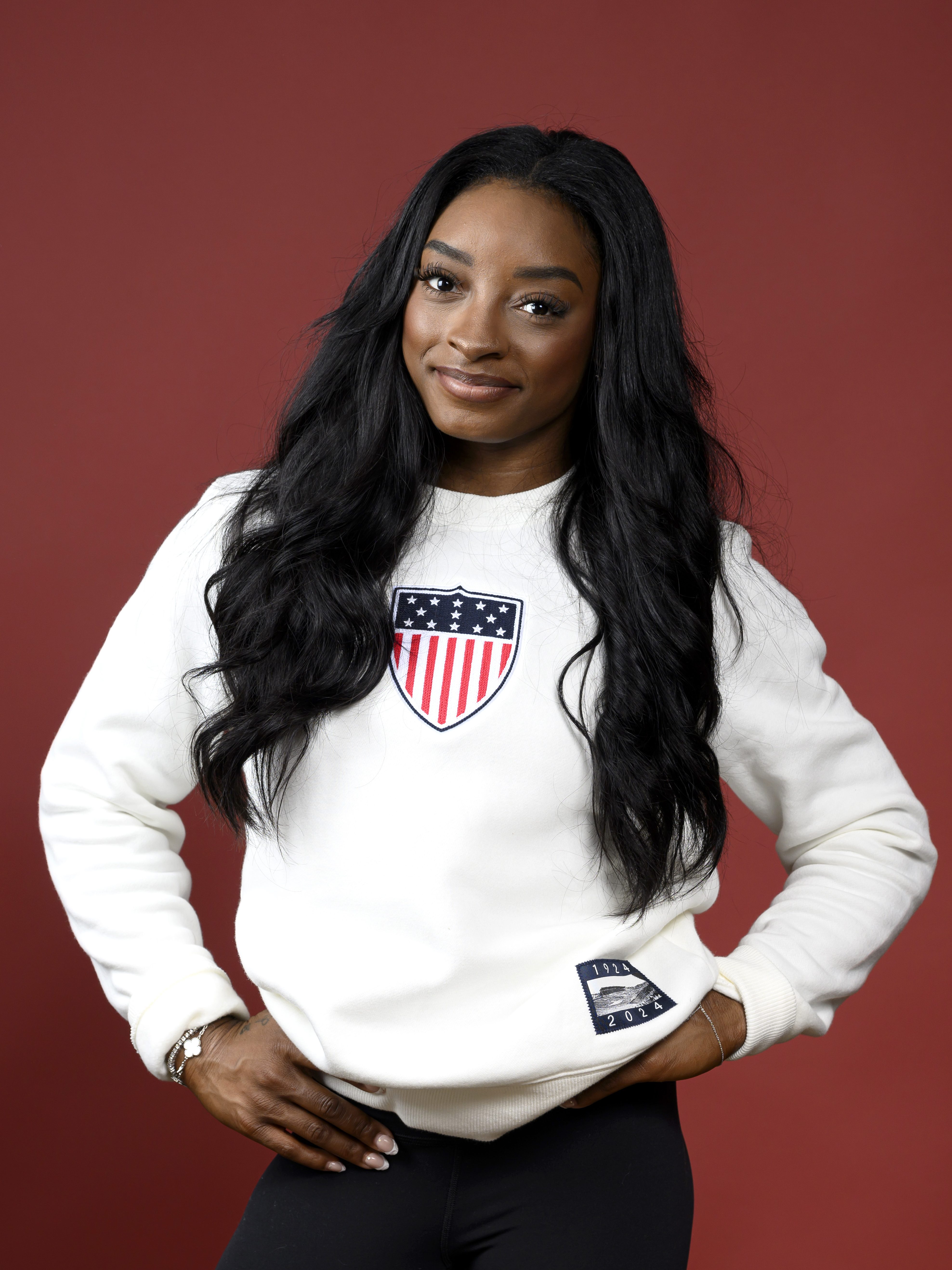 PARIS, FRANCE - AUGUST 06: (BROADCAST-OUT) Olympian Simone Biles of Team United States poses on the Today Show Set on August 06, 2024 in Paris, France. (Photo by Kristy Sparow/Getty Images)