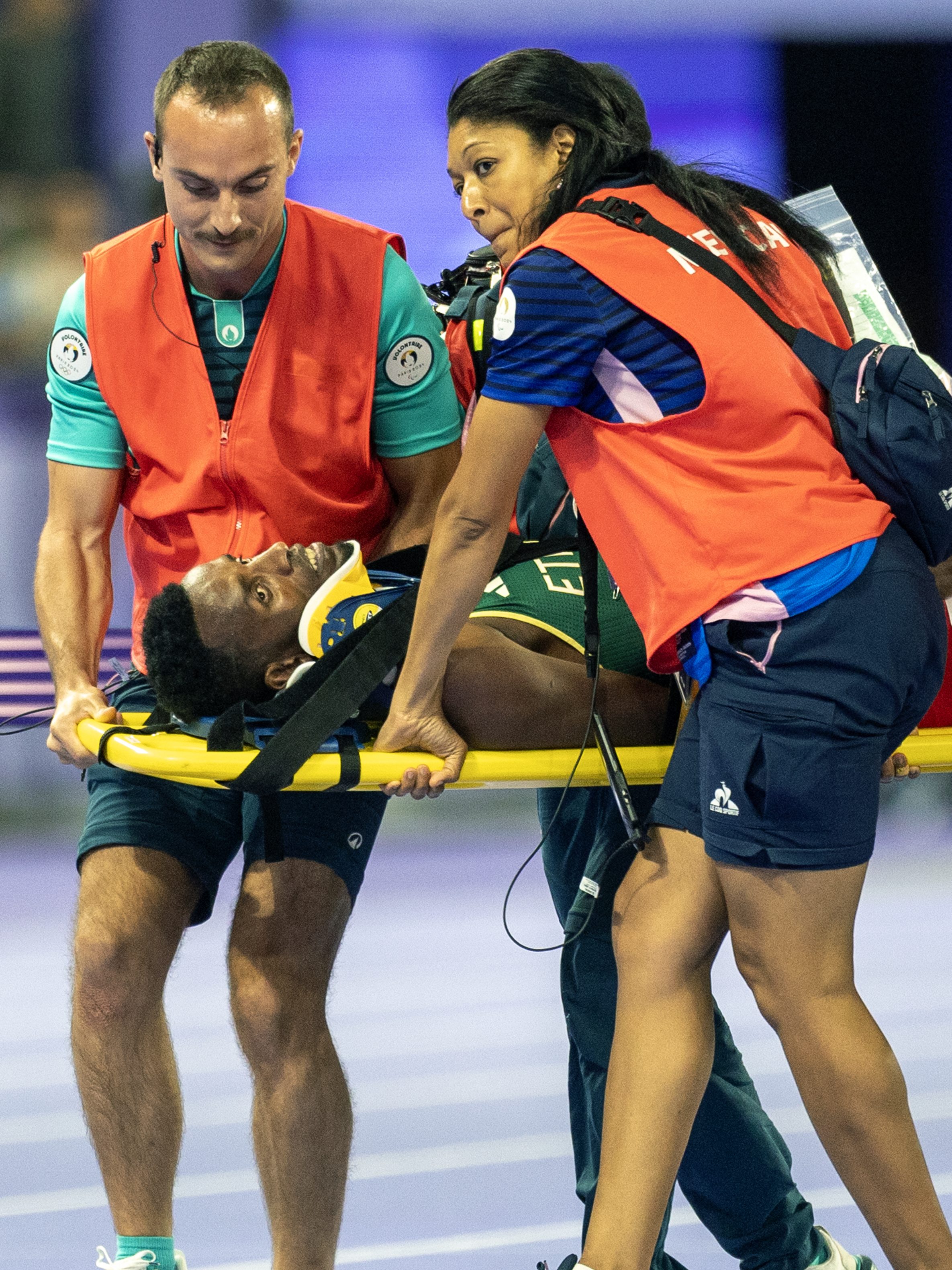 PARIS, FRANCE: AUGUST 07:  Lamecha Girma of Ethiopia is stretchered from the track after falling in the Men's 3000m Steeplechase final during the Athletics Competition at the Stade de France during the Paris 2024 Summer Olympic Games on August 7th, 2024, in Paris, France. (Photo by Tim Clayton/Corbis via Getty Images)