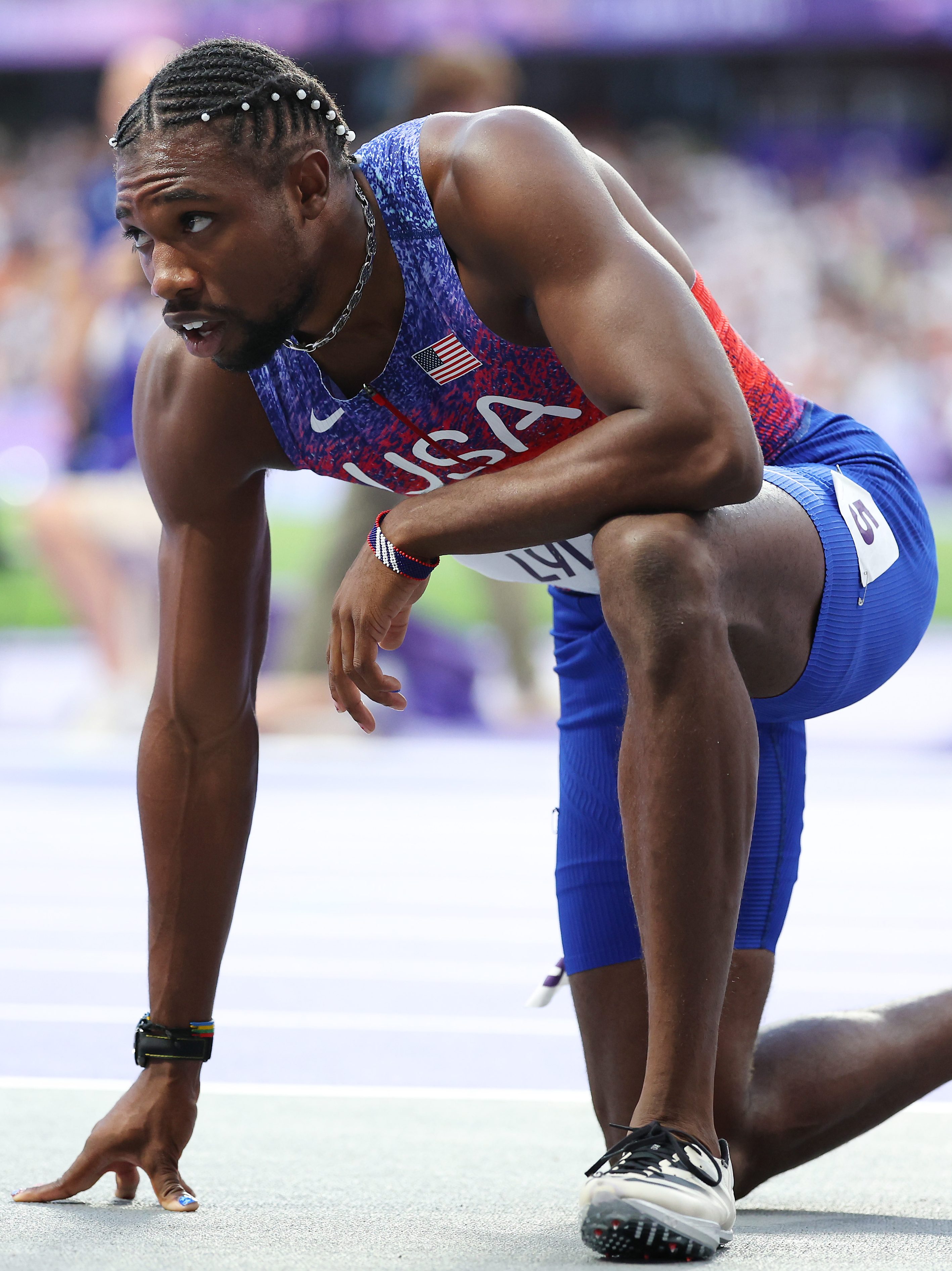 PARIS, FRANCE - AUGUST 08: Bronze medalist Noah Lyles of Team United States shows his dejection after competing in the Men's 200m Final on day thirteen of the Olympic Games Paris 2024 at Stade de France on August 08, 2024 in Paris, France. (Photo by Hannah Peters/Getty Images)
