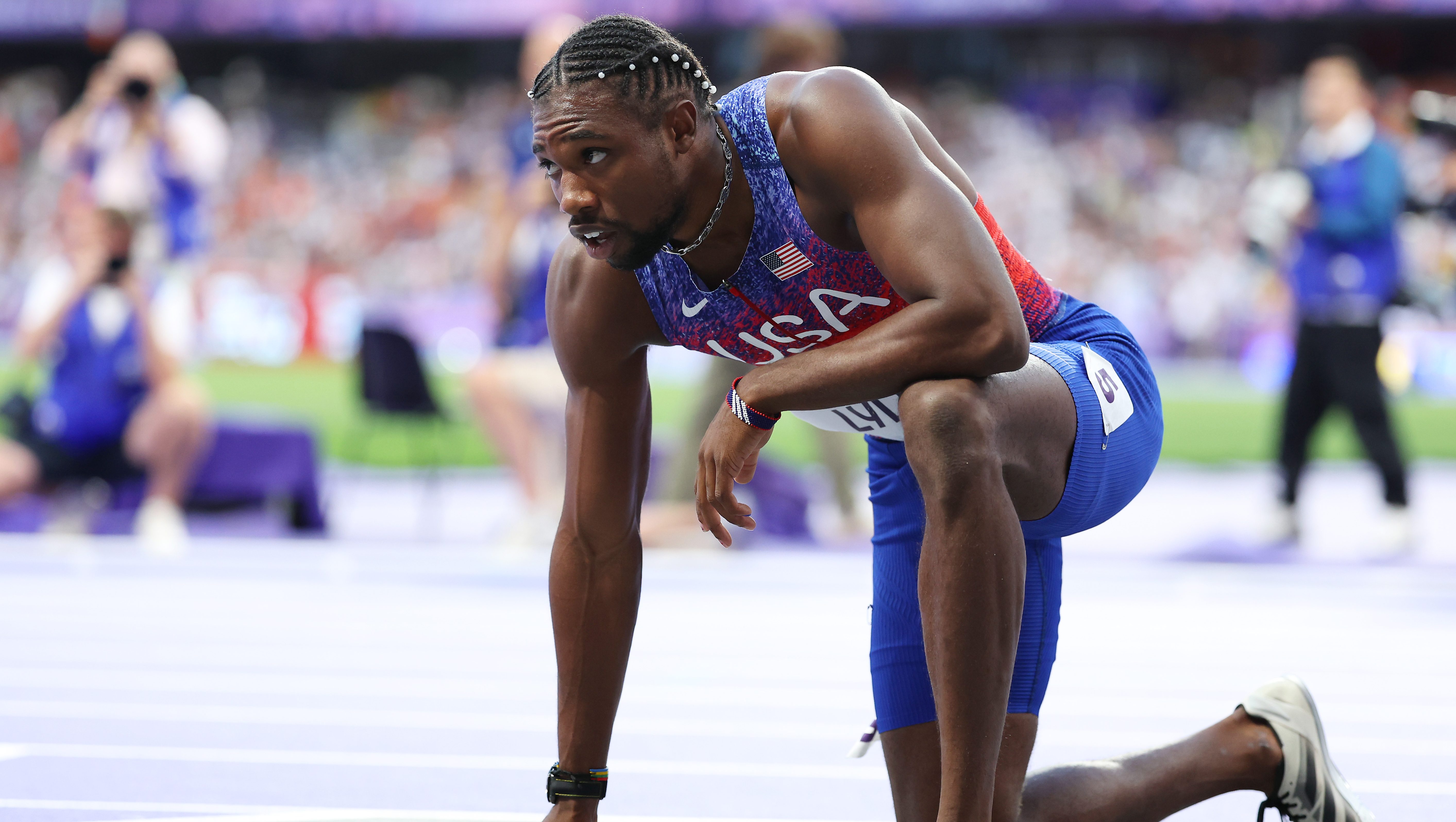 PARIS, FRANCE - AUGUST 08: Bronze medalist Noah Lyles of Team United States shows his dejection after competing in the Men's 200m Final on day thirteen of the Olympic Games Paris 2024 at Stade de France on August 08, 2024 in Paris, France. (Photo by Hannah Peters/Getty Images)