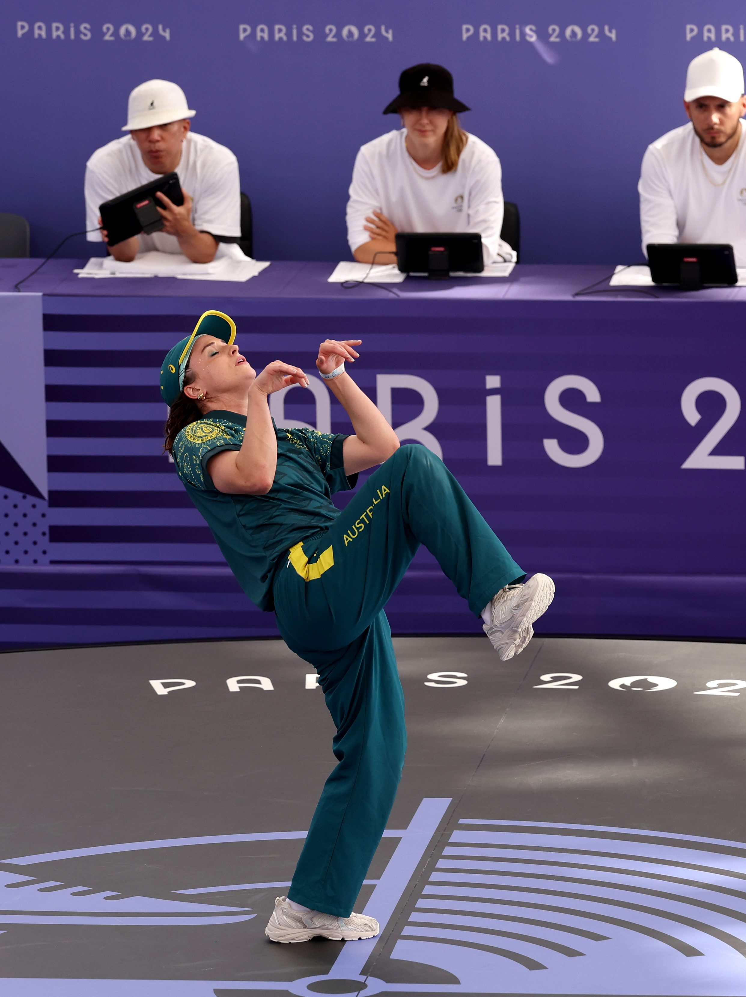 PARIS, FRANCE - AUGUST 09: B-Girl Raygun of Team Australia 
competes during the B-Girls Round Robin - Group B on day fourteen of the Olympic Games Paris 2024 at Place de la Concorde on August 09, 2024 in Paris, France. (Photo by Ezra Shaw/Getty Images)