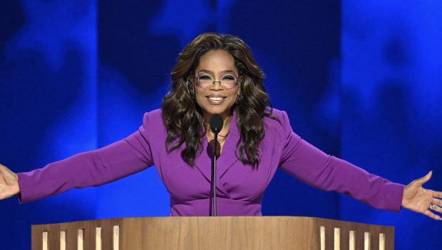 Oprah Winfrey speaks on the third day of the Democratic National Convention wearing purple