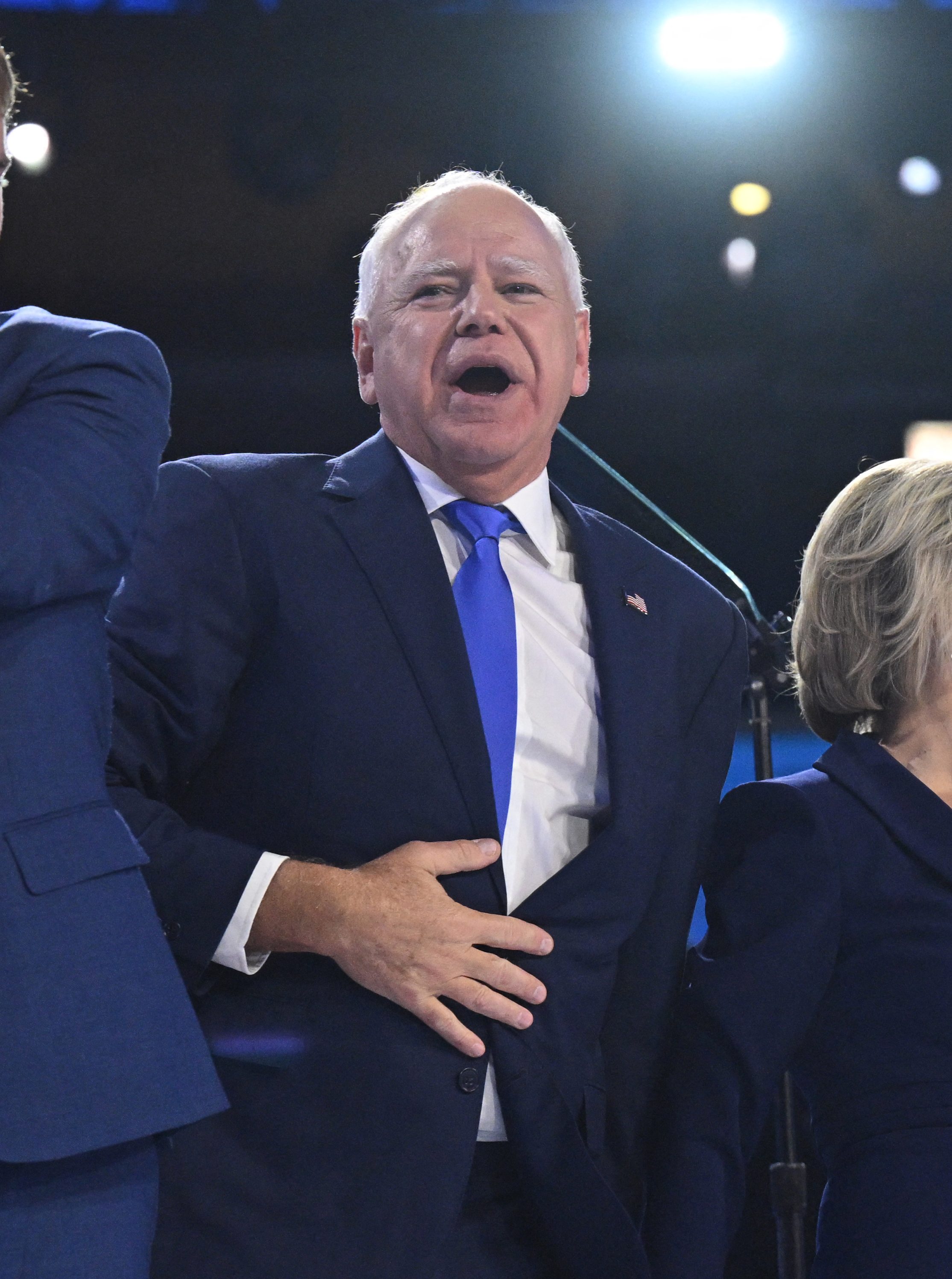 Tim Walz stands with wife Gwen, and children Gus and Hope