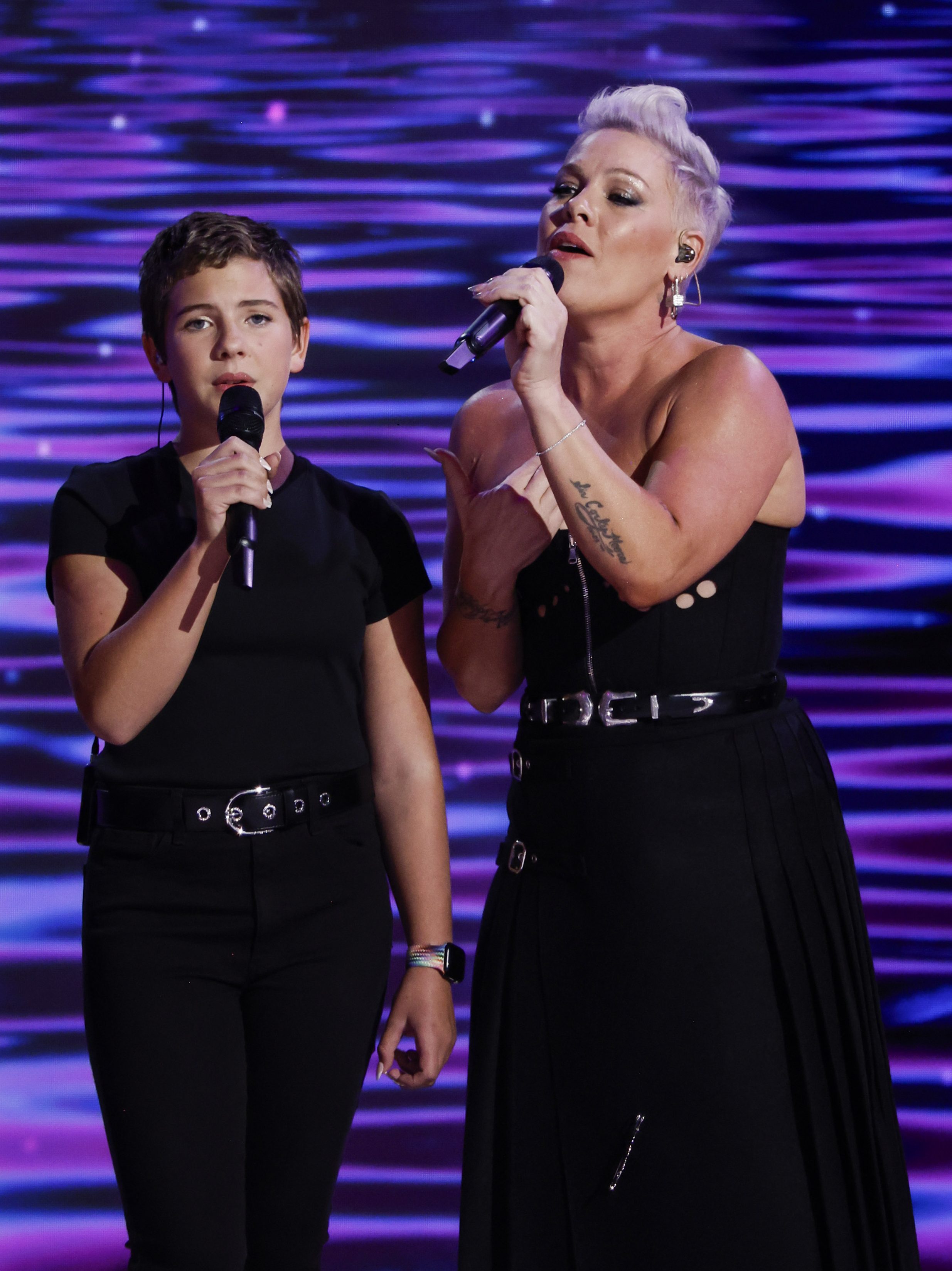Willow Sage Hart, P!NK and Justin Derrico perform during the final day of the Democratic National Convention