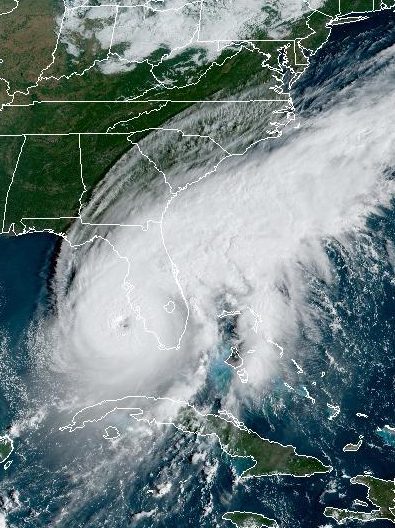 In this NOAA handout image taken by the GOES satellite at 13:26 UTC, Hurricane Ian moves toward Florida on September 28, 2022 in the Gulf of Mexico. The storm is expected to bring a potentially life-threatening storm surge and hurricane-force winds. (Photo by NOAA via Getty Images)