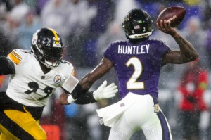 BALTIMORE, MARYLAND - JANUARY 06: Tyler Huntley #2 of the Baltimore Ravens throws a pass while being pressured by Larry Ogunjobi #99 of the Pittsburgh Steelers in the first quarter of a game at M&T Bank Stadium on January 06, 2024 in Baltimore, Maryland. (Photo by Rob Carr/Getty Images)