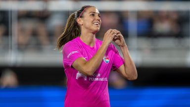 WASHINGTON, DC - JUNE 15: Alex Morgan #13 of San Diego Wave FC interacts with Washington Spirit fans during a game between San Diego Wave FC and Washington Spirit at Audi Field on June 15, 2024 in Washington, DC. (Photo by Brad Smith/ISI Photos/Getty Images).