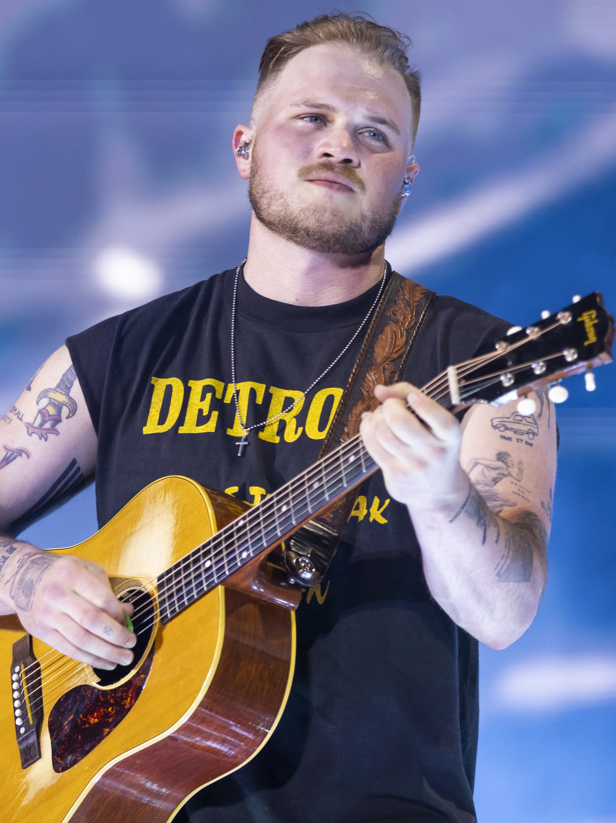 DETROIT, MICHIGAN - JUNE 20: Zach Bryan performs in support of his "The Quittin Time Tour 2024" at Ford Field on June 20, 2024 in Detroit, Michigan. (Photo by Scott Legato/Getty Images)