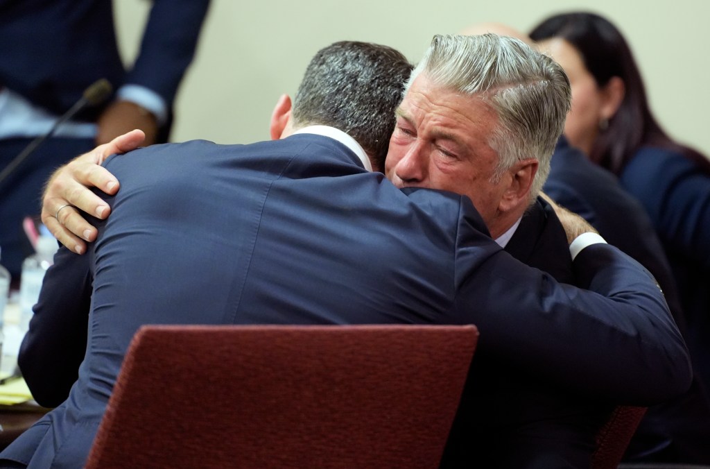 Alec Baldwin hugs his attorney Alex Spiro at the conclusion of his trial for involuntary manslaughter in First Judicial District Court on July 12, 2024 in Santa Fe, New Mexico. The trial for involuntary manslaughter was dismissed by a judge Friday after she ruled that key evidence over a fatal shooting on the set of "Rust" had been withheld from the defense. (Photo by Ramsay de Give-Pool/Getty Images)