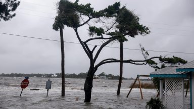 CEDAR KEY, FLORIDA - AUGUST 05: High winds, rain and storm surge from Hurricane Debby inundate a neighborhood on August 05, 2024, in Cedar Key, Florida. Hurricane Debby brings rain storms and high winds along Florida’s Big Bend area. (Photo by Joe Raedle/Getty Images)