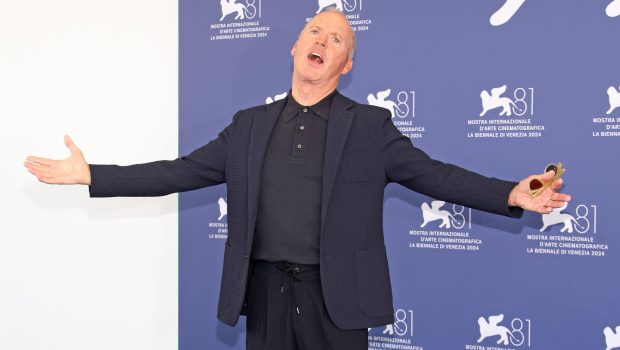 VENICE, ITALY - AUGUST 28: Michael Keaton attends a photocall for "Beetlejuice Beetlejuice" during the 81st Venice International Film Festival at  on August 28, 2024 in Venice, Italy. (Photo by Daniele Venturelli/WireImage)