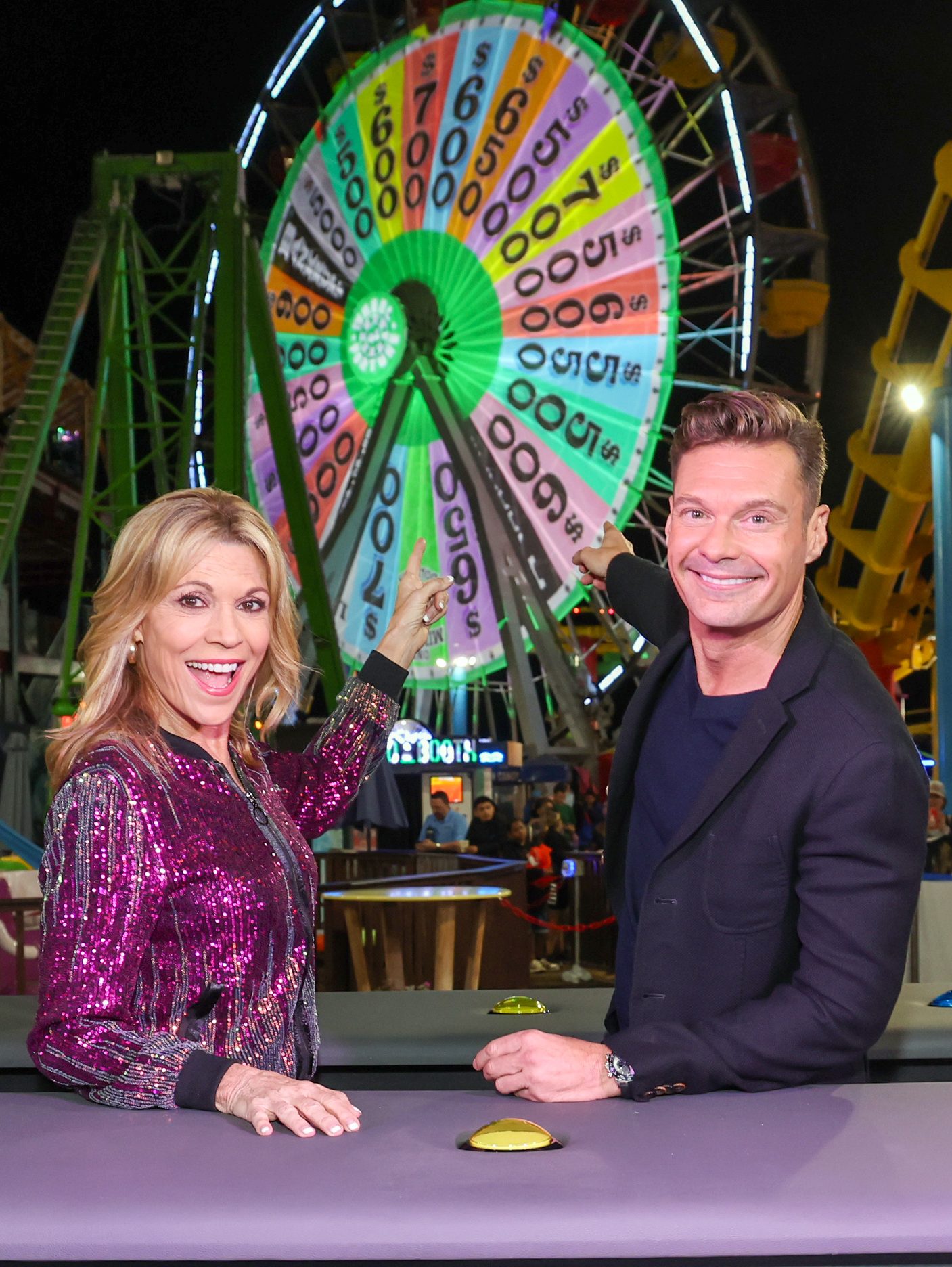 SANTA MONICA, CALIFORNIA - AUGUST 30: (L-R) Vanna White and Ryan Seacrest attend the WOF S42 – Pier Wheel Launch at Santa Monica Pier on August 30, 2024 in Santa Monica, California. (Photo by Phillip Faraone/Getty Images for CBS Media Ventures / Sony Pictures Television)