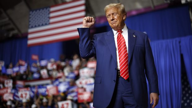 JOHNSTOWN, PENNSYLVANIA - AUGUST 30: Republican presidential nominee, former U.S. President Donald Trump takes the stage during a campaign rally in the 1st Summit Arena at the Cambria County War Memorial on August 30, 2024 in Johnstown, Pennsylvania. Promising to cut energy bills in half, conducting the largest deportation operation in history and putting a 200% tariff on foreign made automobiles, Trump called his election opponents "Comrade Kamala," and "Tampon Tim" while rallying in the all-important battleground state of Pennsylvania. (Photo by Chip Somodevilla/Getty Images)