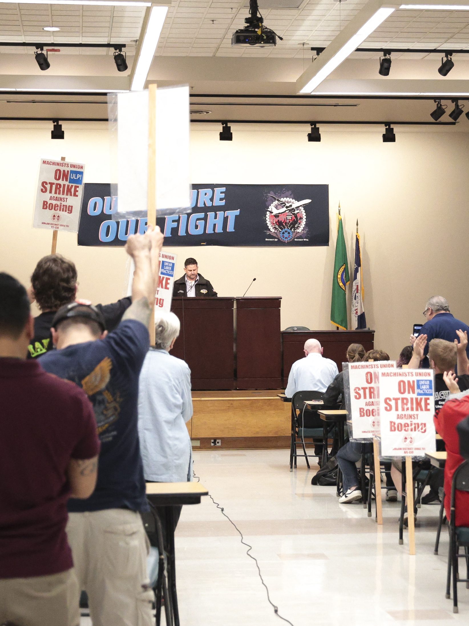 Aerospace Machinists District 751 President Jon Holden announces that union members have rejected a proposed Boeing contract and will go on strike, following voting results at their union hall in Seattle, Washington, on September 12, 2024. Boeing workers in the Seattle region overwhelmingly voted to strike on September 12, rejecting a contract the embattled aviation giant characterized as a boon for staff given the company's stressed financial condition. (Photo by Jason Redmond / AFP) (Photo by JASON REDMOND/AFP via Getty Images)