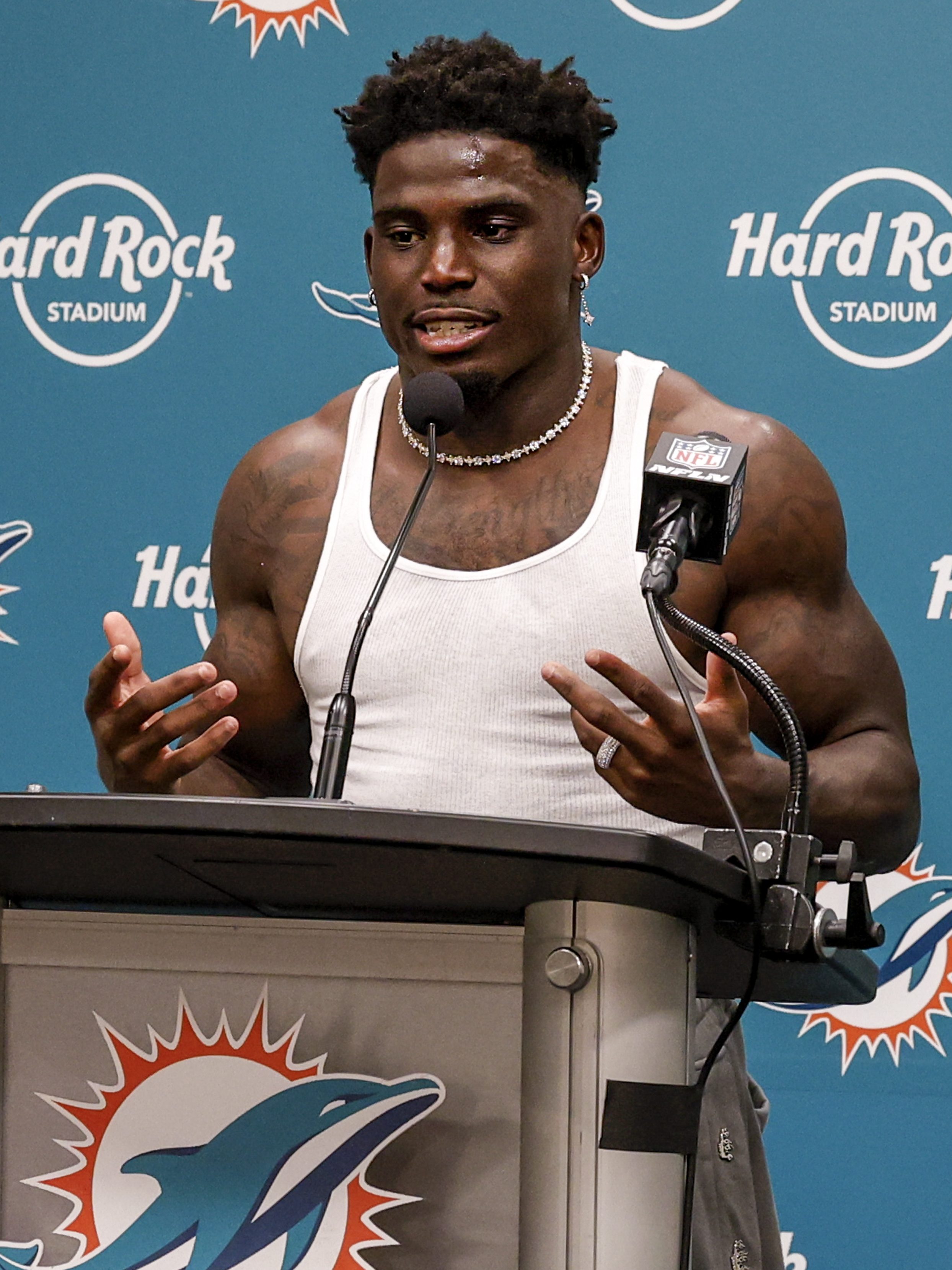 MIAMI GARDENS, FL - SEPTEMBER 8: Wide Receiver Tyreek Hill #10 of the Miami Dolphins addresses the media during the post-game press conference after playing the Jacksonville Jaguars at Hard Rock Stadium on September 8, 2024 in Miami Gardens, Florida. Hill was handcuffed and placed facedown on a street by police officers after he was stopped for a traffic violation near Hard Rock Stadium just hours before his team was to open the 2024 football season. The Dolphins defeated the Jaguars 20-17. (Photo by Don Juan Moore/Getty Images)