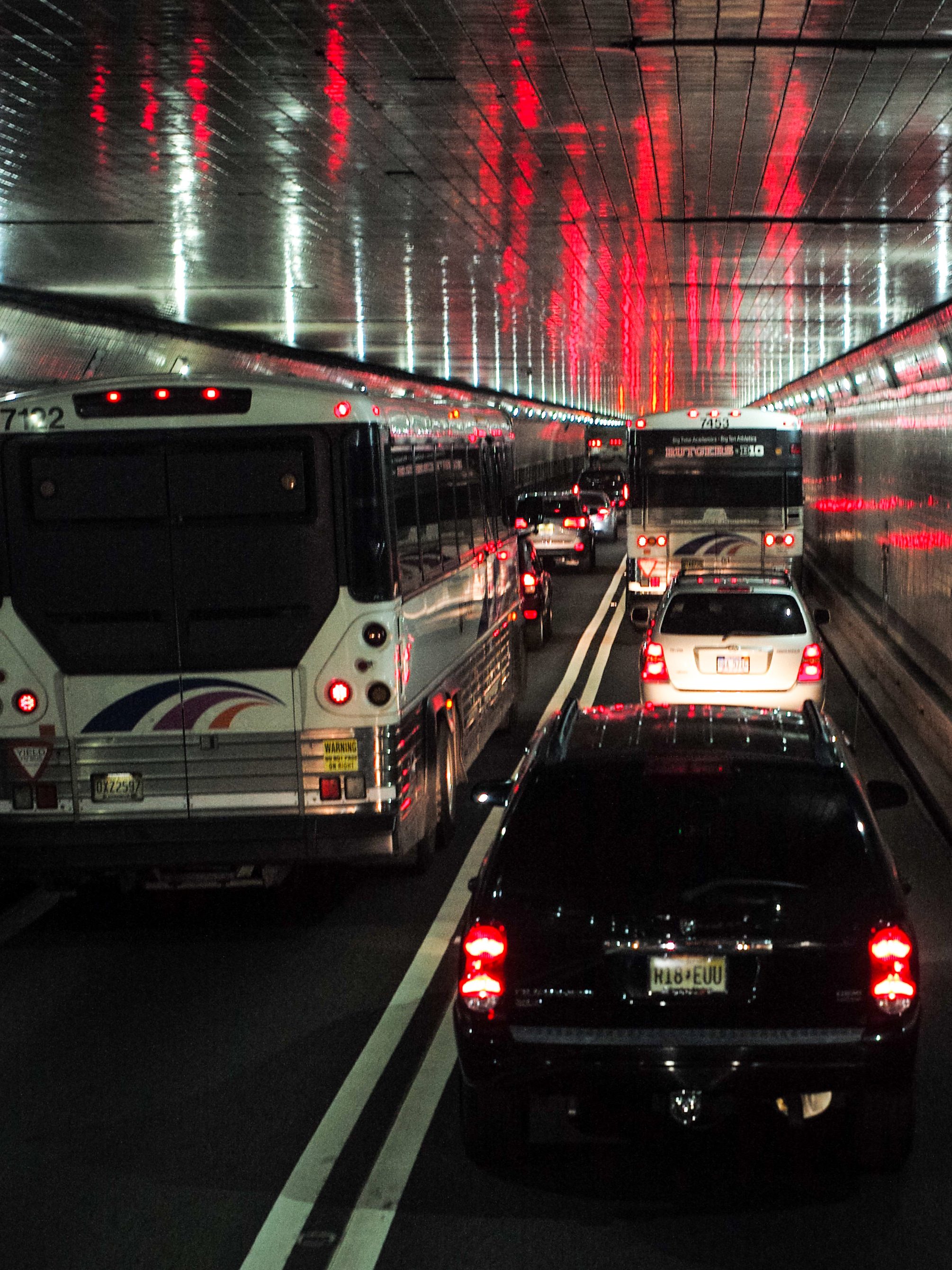 WEEHAWKEN, NEW JERSEY - NOVEMBER 10: Bus passengers  on board a Megabus coach service are caught in traffic November 10, 2014 in the Lincoln Tunnel in Weehawken, New Jersey. (Photo by Robert Nickelsberg/Getty Images)