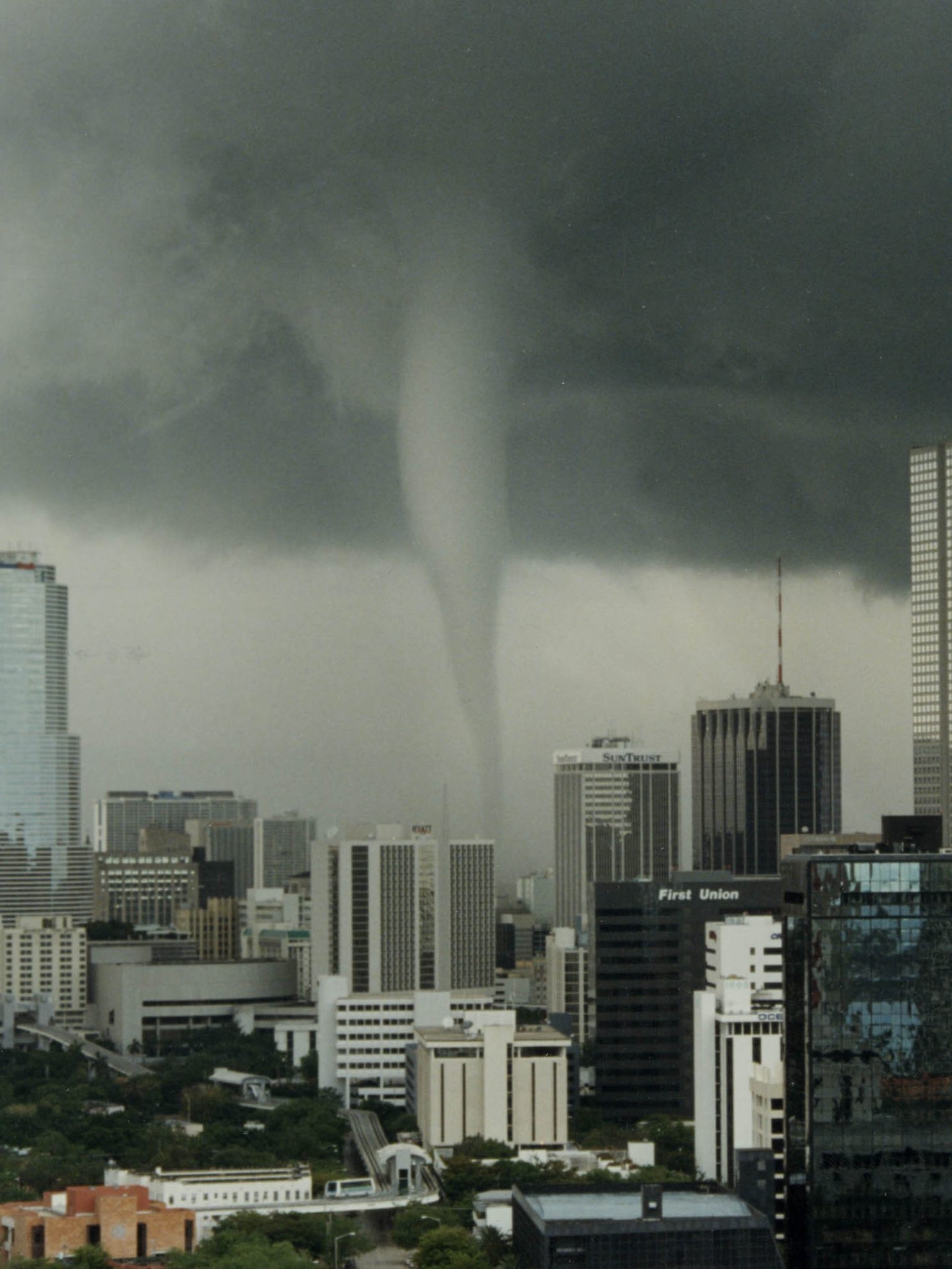 The Funnel Of A Tornado Touches Down May 12, 1997 In Miami, Fl. Five People Were Injured And Approximately Twenty Thousand Residents Lost Power When The Storm Struck Downtown Miami. (Photo By Miami Herald/Getty Images)