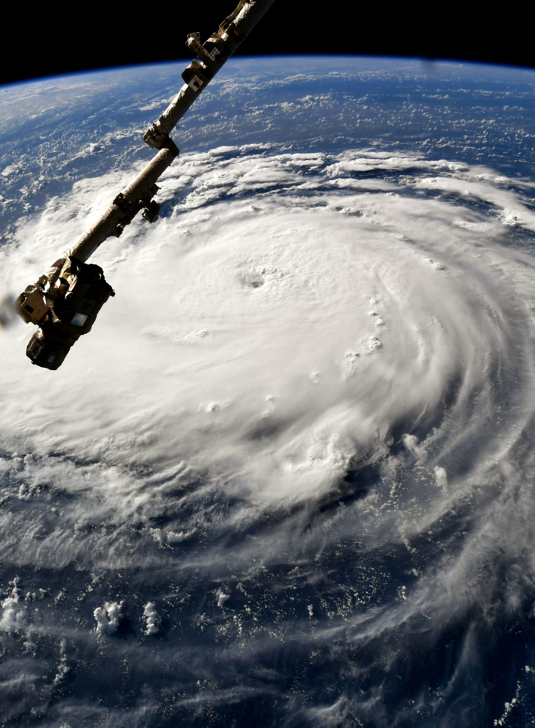 Hurricane Florence gains strength in the Atlantic Ocean as it moves west, seen from the International Space Station on September 10, 2018. Weather predictions say the storm will likely hit the U.S. East Coast as early as Thursday, September 13 bringing massive winds and rain. (Photo by NASA via Getty Images)