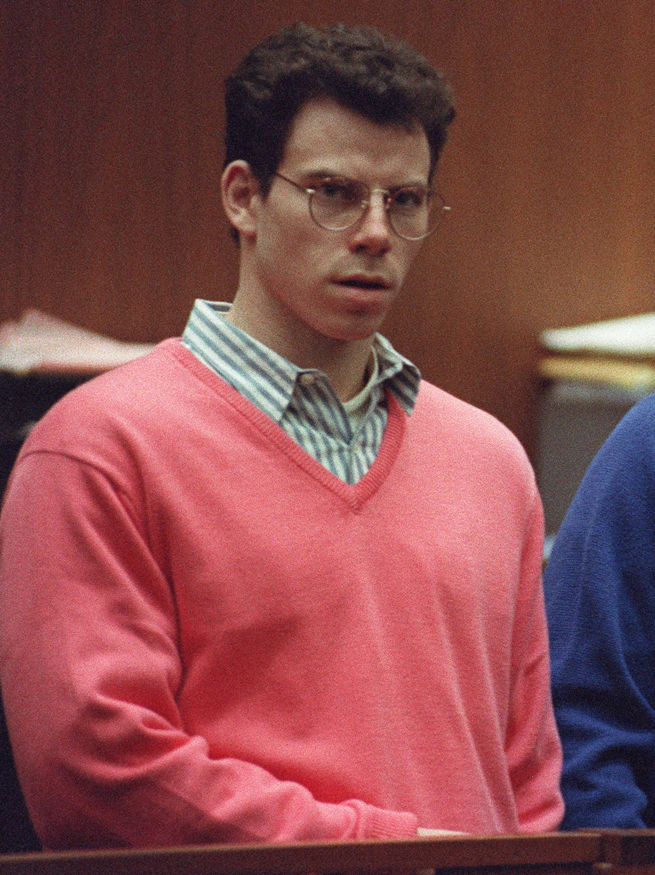 Erik Menendez (L) and his brother Lyle (R) listen during a pre-trial hearing, on December 29, 1992 in Los Angeles after the two pleaded innocent in the August 1989 shotgun deaths of their wealthy parents, Jose and Mary Louise Menendez of Beverly Hills, Calif. It took 40 months for the Superior Court arraignment after prosecutors and defense attorneys battled over the admissibility of taped confessions the brothers allegedly made to their psychotherapist. AFP PHOTO VINCE BUCCI (Photo by VINCE BUCCI / AFP) (Photo by VINCE BUCCI/AFP via Getty Images)