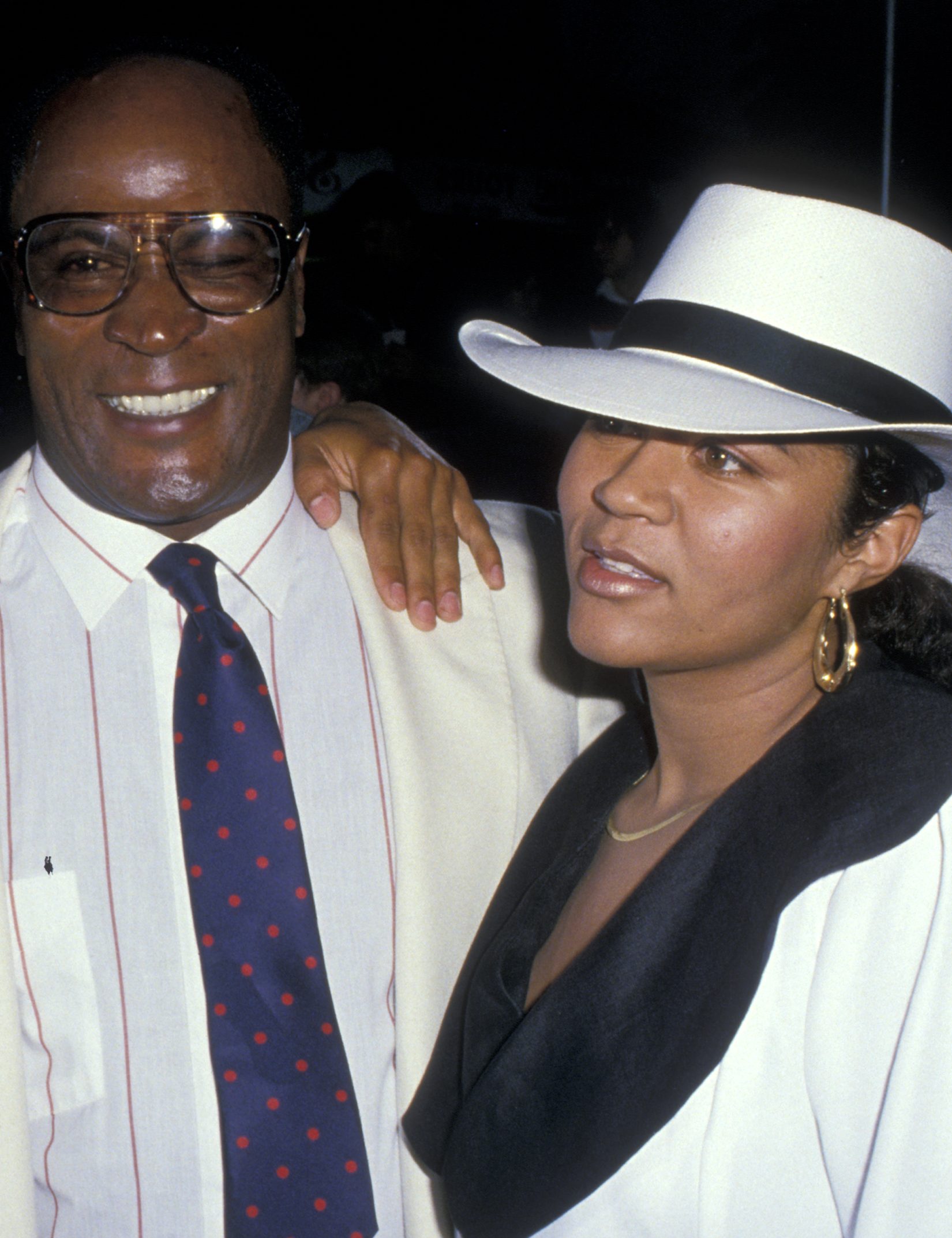 John Amos, wife Noel Amos and son Kelly Amos attend the premiere of "Coming To America" on June 26, 1988 at Mann Chinese Theater in Hollywood, California. (Photo by Ron Galella, Ltd./Ron Galella Collection via Getty Images)