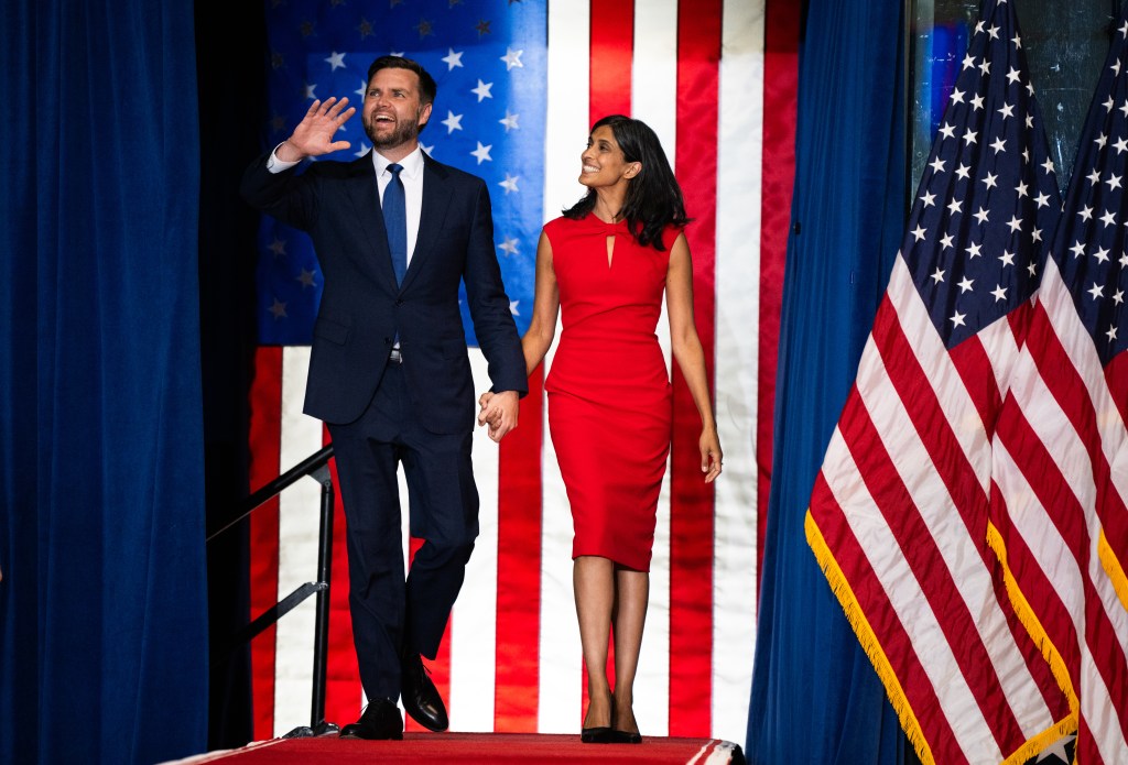 ST CLOUD, MINNESOTA - JULY 27: Republican vice presidential nominee U.S. Sen. J.D. Vance (R-OH) walks out with his wife Usha Vance to speak during a rally with running mate U.S. Republican Presidential nominee former President Donald Trump at Herb Brooks National Hockey Center on July 27, 2024 in St Cloud, Minnesota. Trump hopes to flip the state of Minnesota this November, which hasn't been carried by a Republican in a presidential election since 1972. (Photo by Stephen Maturen/Getty Images)