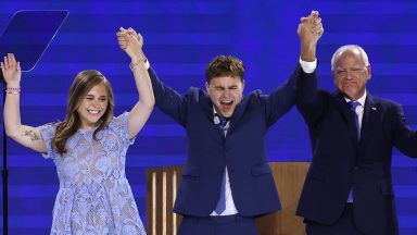 CHICAGO, ILLINOIS - AUGUST 21: Democratic vice presidential nominee Minnesota Gov. Tim Walz celebrates with his daughter Hope Walz (L), son Gus Walz (2nd-L) and wife Gwen Walz (R) after accepting the Democratic vice presidential nomination on stage during the third day of the Democratic National Convention at the United Center on August 21, 2024 in Chicago, Illinois. Delegates, politicians, and Democratic Party supporters are in Chicago for the convention, concluding with current Vice President Kamala Harris accepting her party's presidential nomination. The DNC takes place from August 19-22.   (Photo by Chip Somodevilla/Getty Images)