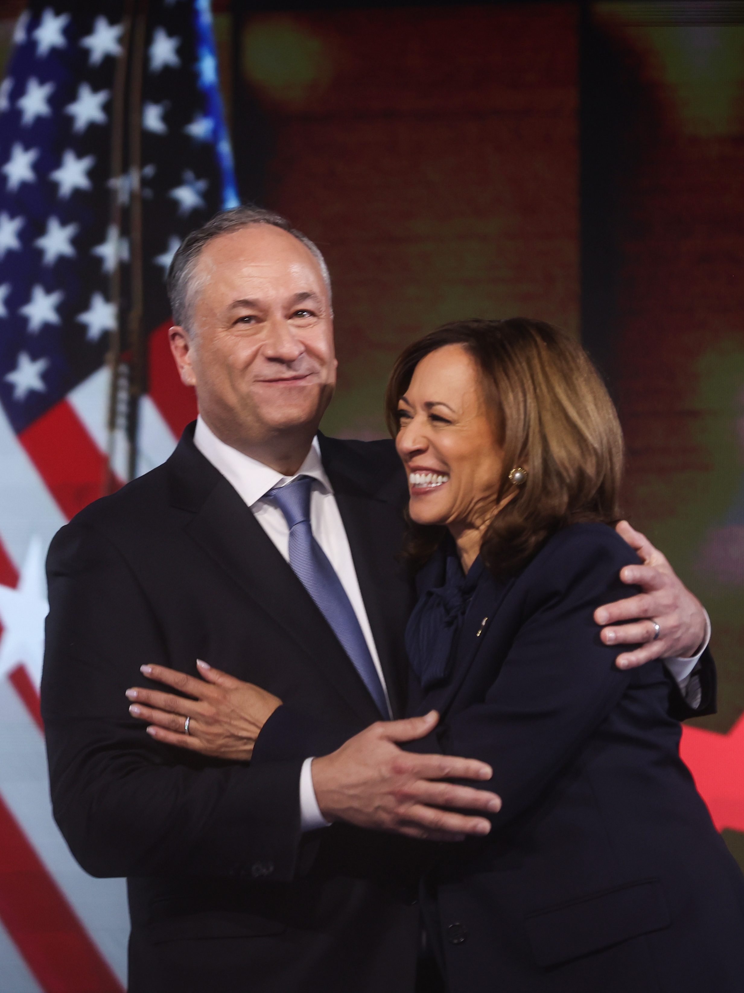 CHICAGO, ILLINOIS - AUGUST 22: Second Gentleman Doug Emhoff and Democratic presidential nominee, U.S. Vice President Kamala Harris celebrate after she accepted the Democratic presidential nomination during the final day of the Democratic National Convention at the United Center on August 22, 2024 in Chicago, Illinois. Delegates, politicians, and Democratic Party supporters are gathering in Chicago, as current Vice President Kamala Harris is named her party's presidential nominee. The DNC takes place from August 19-22. (Photo by Justin Sullivan/Getty Images)