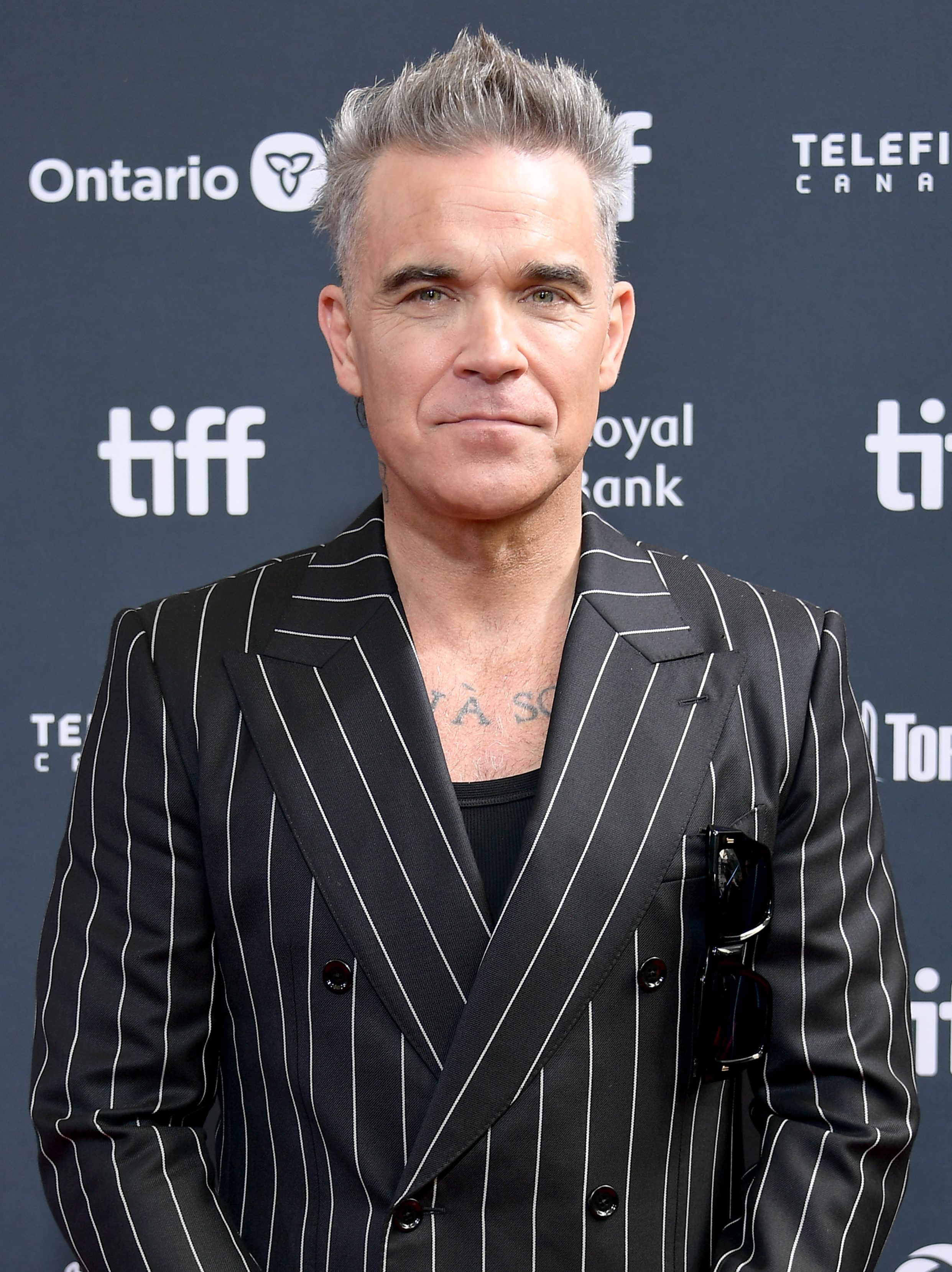 TORONTO, ONTARIO - SEPTEMBER 09: Robbie Williams attends the premiere of "Better Man" during the 2024 Toronto International Film Festival at Roy Thomson Hall on September 09, 2024 in Toronto, Ontario. (Photo by Unique Nicole/Getty Images)