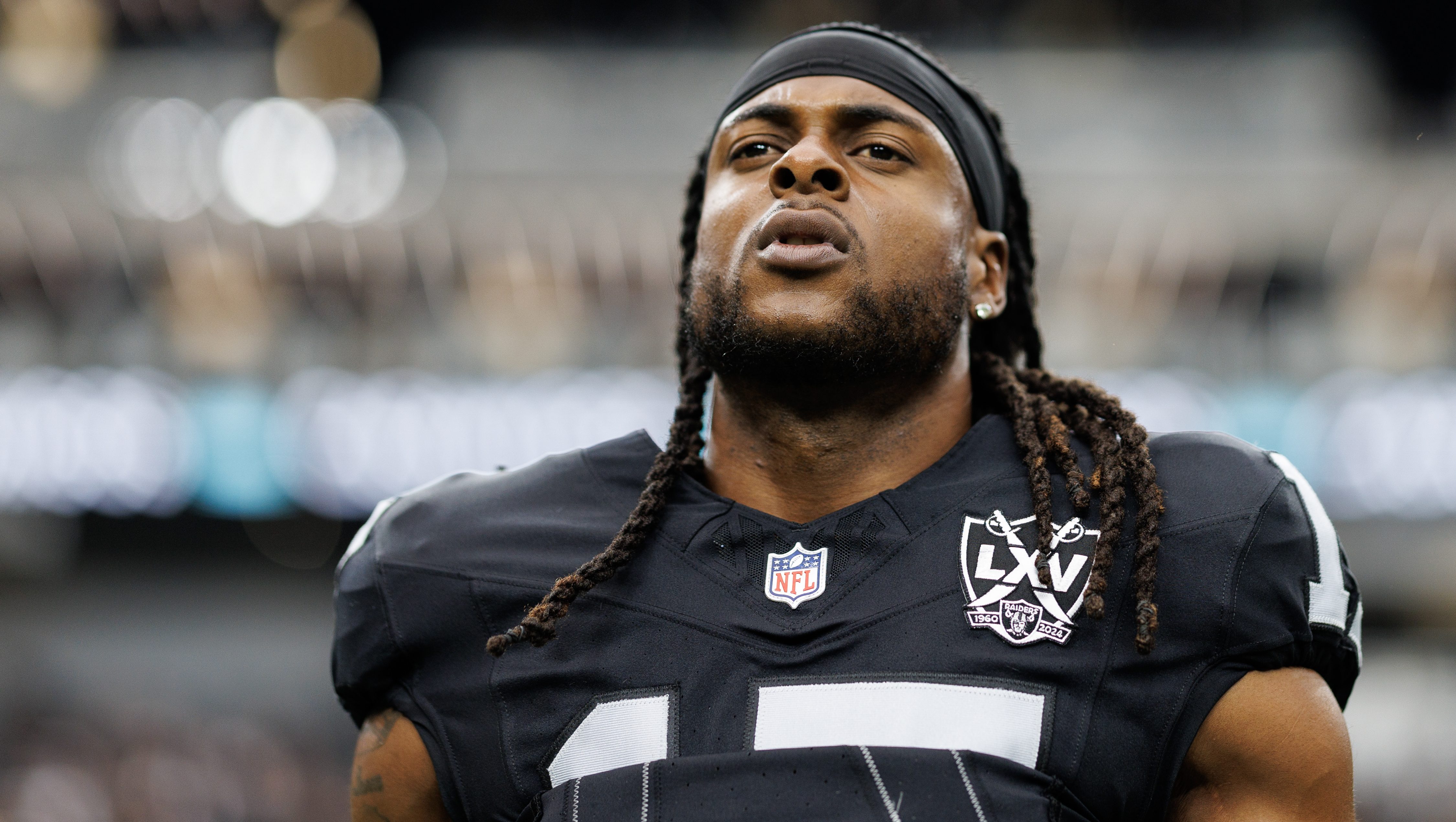 LAS VEGAS, NEVADA - SEPTEMBER 22: Wide receiver Davante Adams #17 of the Las Vegas Raiders stretches prior to an NFL football game against the Carolina Panthers, at Allegiant Stadium on September 22, 2024 in Las Vegas, Nevada. (Photo by Brooke Sutton/Getty Images)