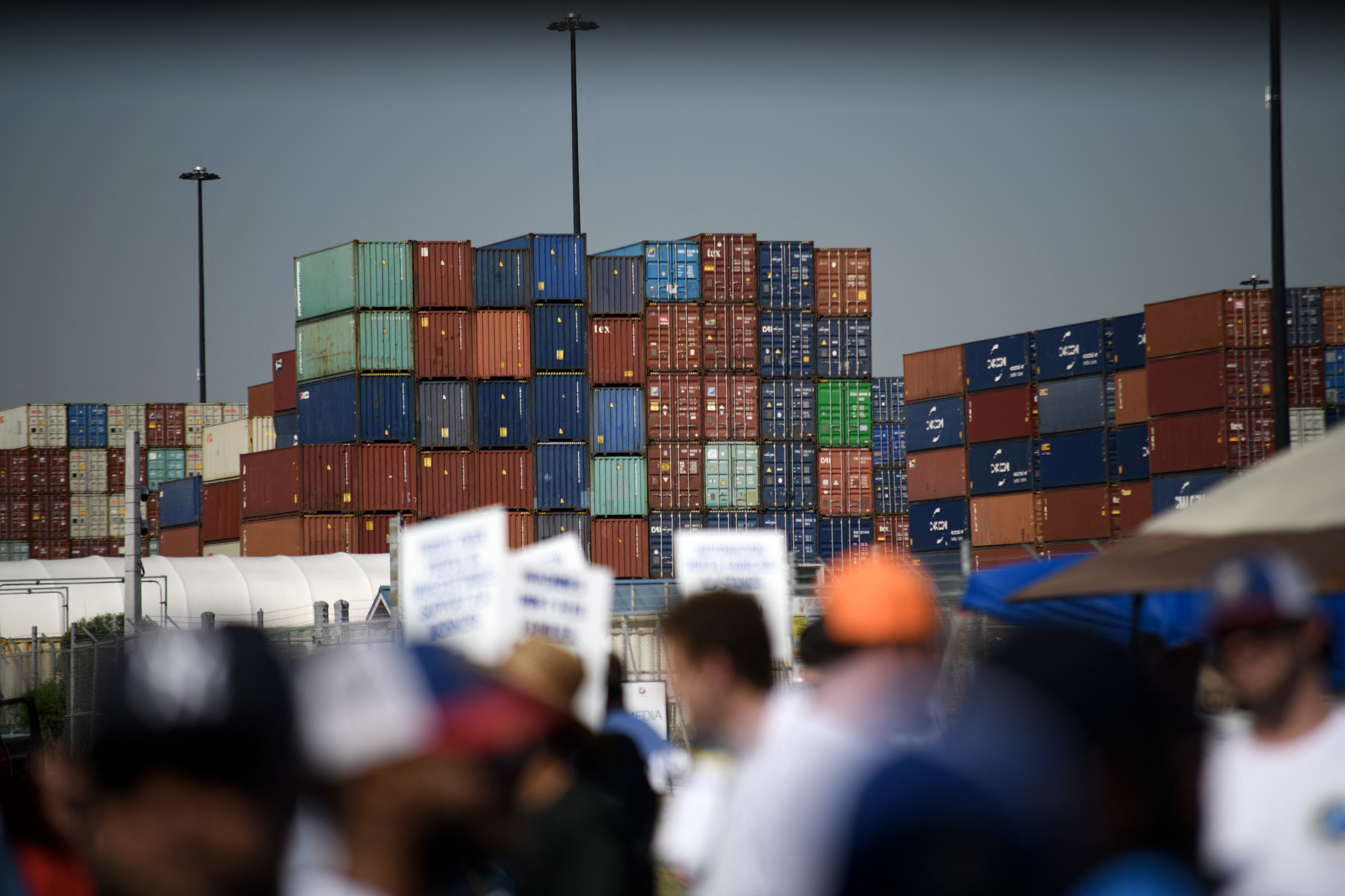 Dockworkers strike at the Bayport Container Terminal in Seabrook, Texas, on October 1, 2024. Officials at 14 ports along the US East and Gulf Coasts were making last-minute preparations on September 30 for a likely labor strike that could drag on the US economy just ahead of a presidential election -- despite last-minute talks. (Photo by Mark Felix / AFP) (Photo by MARK FELIX/AFP via Getty Images)